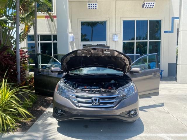 2012 Urban Titanium Metallic /Beige Honda CR-V 1 FL OWNER EX-L LOW MILES 47,572 (5J6RM3H77CL) with an 2.4L DOHC MPFI 16-Valve i-VTEC I4 Engine engine, Automatic transmission, located at 4701 North Dixie Hwy, Pompano Beach, FL, 33064, (954) 422-2889, 26.240938, -80.123474 - OUR WEBPAGE FLORIDACARS1.COM HAS OVER 100 PHOTOS AND FREE CARFAX LINK 2012 HONDA CR-V EX-L VIN: 5J6RM3H77CL033637 5 J 6 R M 3 H 7 7 C L 0 3 3 6 3 7 4 DOOR WAGON/SPORT UTILITY 2.4L I4 F DOHC 16V GASOLINE FRONT WHEEL DRIVE Top Features Alloy Wheels Bluetooth Technology Front Seat Heaters Leather Seats - Photo#16