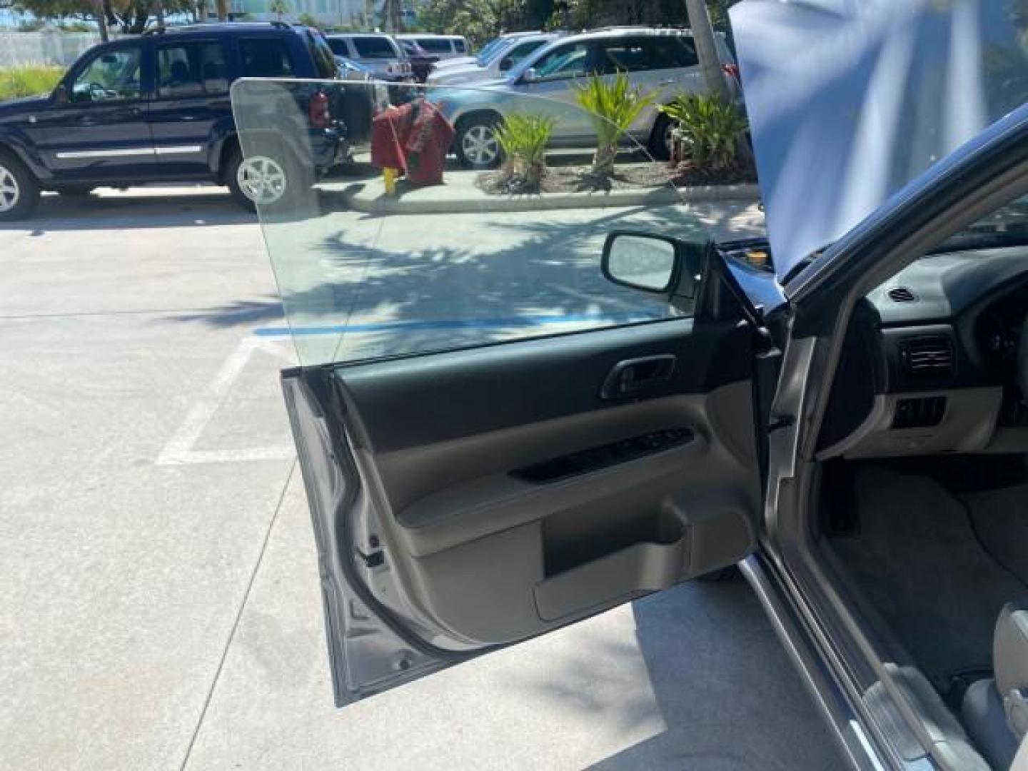 2008 Steel Silver Metallic /Graphite Gray Subaru Forester (Natl) AWD X LOW MILES 51,140 1 OWNER (JF1SG63698H) with an 2.5L SOHC SMPI 16-Valve 4-Cyl Boxer Engine engine, Automatic transmission, located at 4701 North Dixie Hwy, Pompano Beach, FL, 33064, (954) 422-2889, 26.240938, -80.123474 - OUR WEBPAGE FLORIDACARS1.COM HAS OVER 100 PHOTOS AND FREE CARFAX LINK 2008 SUBARU FORESTER 2.5 X VIN: JF1SG63698H707902 J F 1 S G 6 3 6 9 8 H 7 0 7 9 0 2 4 DOOR WAGON/SPORT UTILITY 2.5L H4 F SOHC 16V GASOLINE ALL WHEEL DRIVE Top Features 4WD/AWD Cloth Seats Basic Features ABS Brakes AM/FM Stereo Air - Photo#9