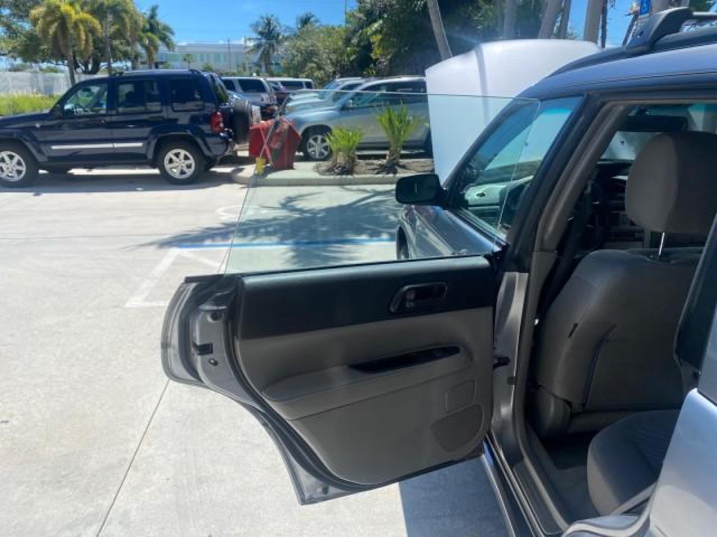 2008 Steel Silver Metallic /Graphite Gray Subaru Forester (Natl) AWD X LOW MILES 51,140 1 OWNER (JF1SG63698H) with an 2.5L SOHC SMPI 16-Valve 4-Cyl Boxer Engine engine, Automatic transmission, located at 4701 North Dixie Hwy, Pompano Beach, FL, 33064, (954) 422-2889, 26.240938, -80.123474 - OUR WEBPAGE FLORIDACARS1.COM HAS OVER 100 PHOTOS AND FREE CARFAX LINK 2008 SUBARU FORESTER 2.5 X VIN: JF1SG63698H707902 J F 1 S G 6 3 6 9 8 H 7 0 7 9 0 2 4 DOOR WAGON/SPORT UTILITY 2.5L H4 F SOHC 16V GASOLINE ALL WHEEL DRIVE Top Features 4WD/AWD Cloth Seats Basic Features ABS Brakes AM/FM Stereo Air - Photo#13
