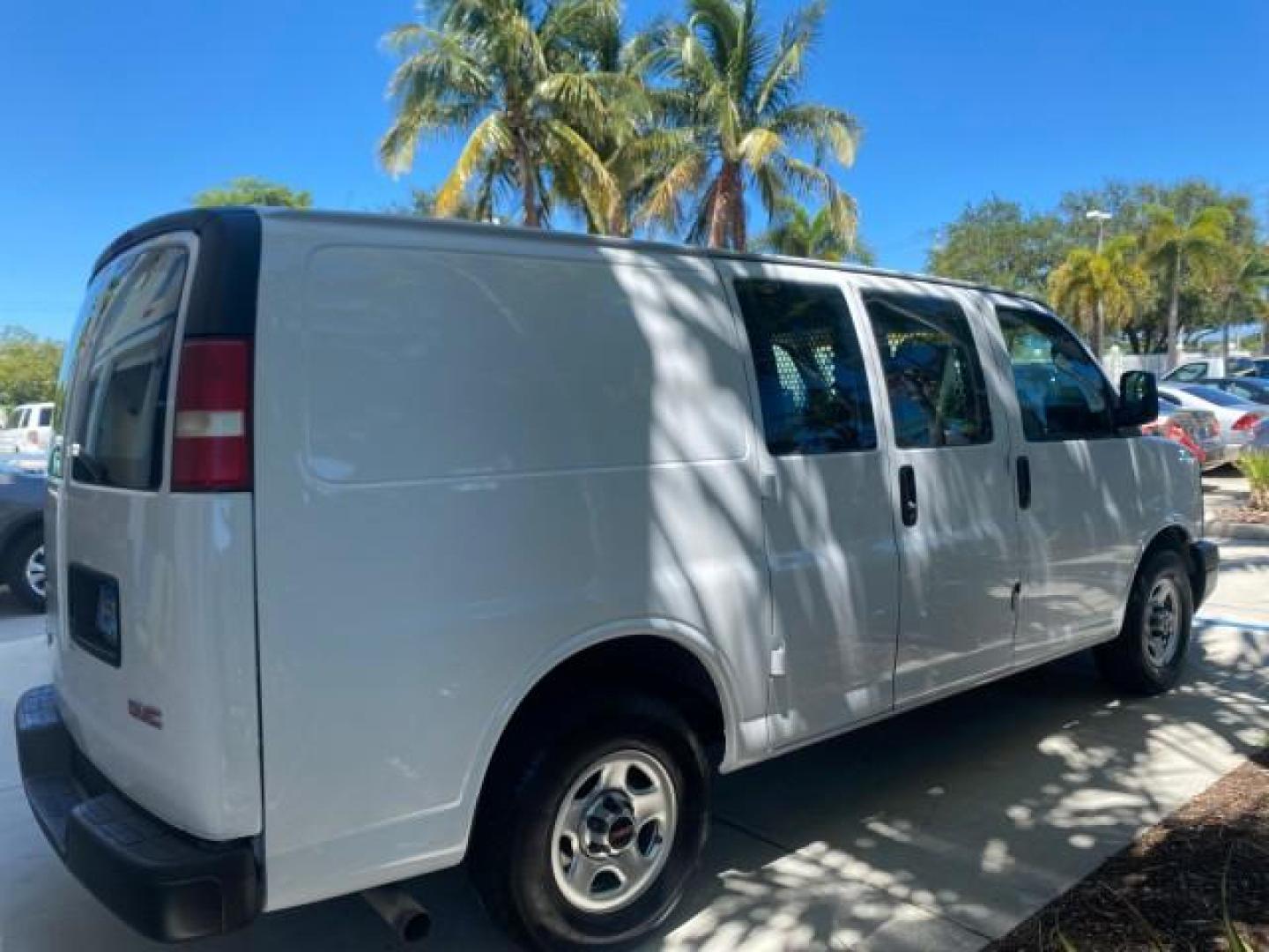 2004 Summit White /Medium Dark Pewter GMC Savana Cargo Van 1 OWNER FL (1GTFG15X141) with an 4.3L Vortec 4300 V6 MFI Engine engine, Automatic transmission, located at 4701 North Dixie Hwy, Pompano Beach, FL, 33064, (954) 422-2889, 26.240938, -80.123474 - OUR WEBPAGE FLORIDACARS1.COM HAS OVER 100 PHOTOS AND FREE CARFAX LINK 2004 GMC SAVANA 1500 THIS VAN IS LIKE NEW! VIN: 1GTFG15X141181482 1 G T F G 1 5 X 1 4 1 1 8 1 4 8 2 VAN 4.3L V6 F GASOLINE REAR WHEEL DRIVE Top Features Conversion Van Vinyl Seats Basic Features ABS Brakes AM/FM Stereo Air Conditi - Photo#7