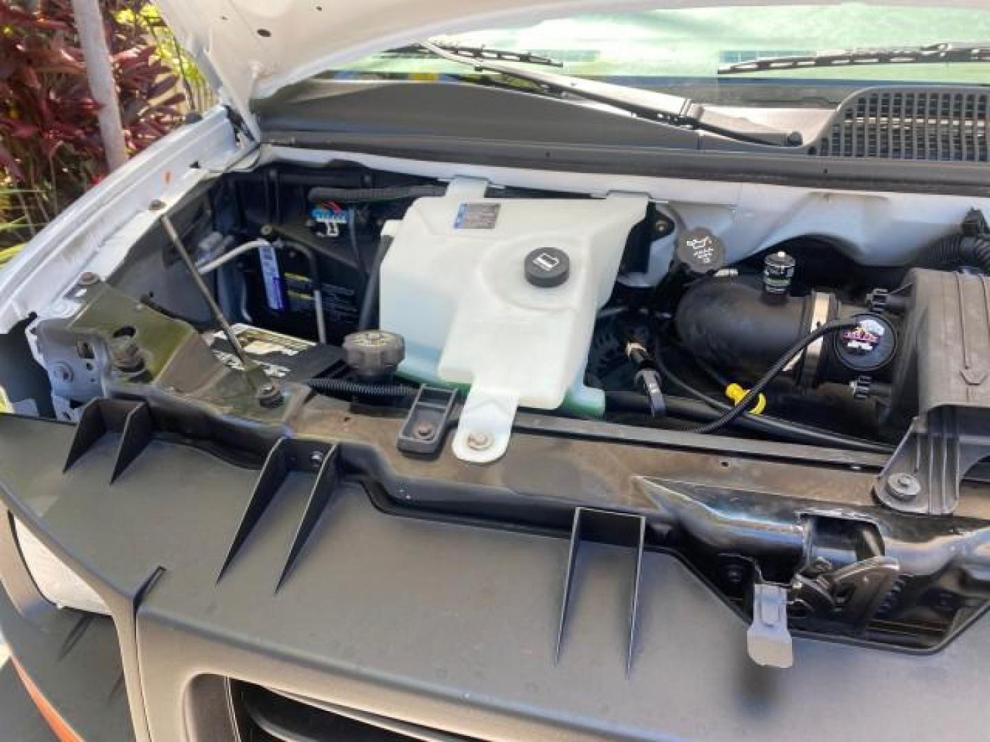 2004 Summit White /Medium Dark Pewter GMC Savana Cargo Van 1 OWNER FL (1GTFG15X141) with an 4.3L Vortec 4300 V6 MFI Engine engine, Automatic transmission, located at 4701 North Dixie Hwy, Pompano Beach, FL, 33064, (954) 422-2889, 26.240938, -80.123474 - OUR WEBPAGE FLORIDACARS1.COM HAS OVER 100 PHOTOS AND FREE CARFAX LINK 2004 GMC SAVANA 1500 THIS VAN IS LIKE NEW! VIN: 1GTFG15X141181482 1 G T F G 1 5 X 1 4 1 1 8 1 4 8 2 VAN 4.3L V6 F GASOLINE REAR WHEEL DRIVE Top Features Conversion Van Vinyl Seats Basic Features ABS Brakes AM/FM Stereo Air Conditi - Photo#25