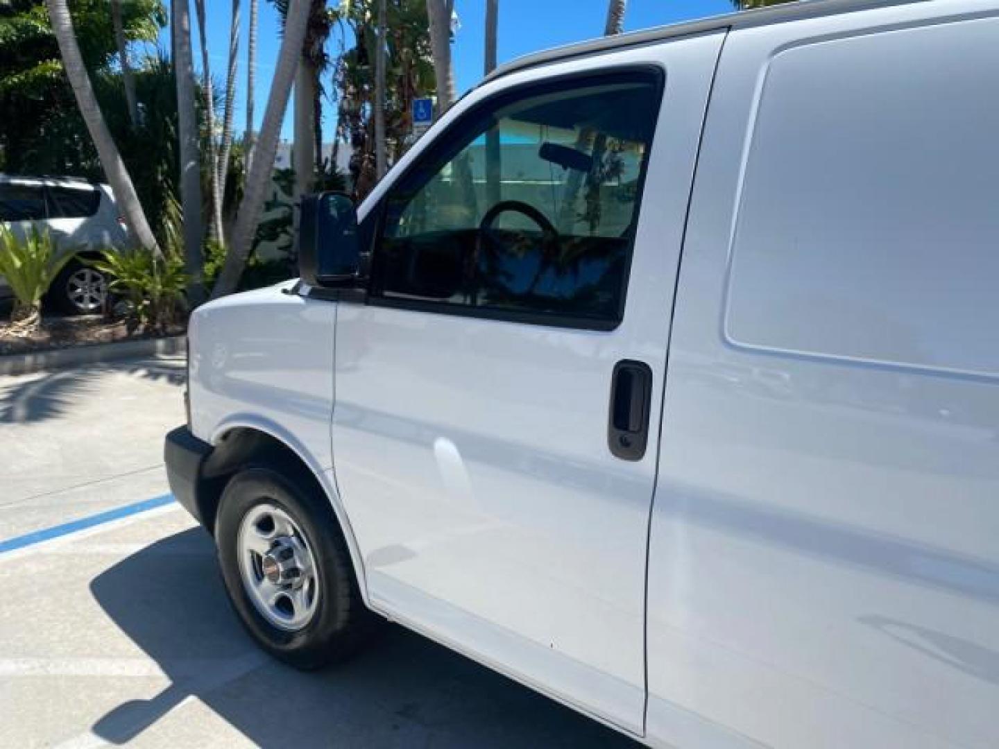 2004 Summit White /Medium Dark Pewter GMC Savana Cargo Van 1 OWNER FL (1GTFG15X141) with an 4.3L Vortec 4300 V6 MFI Engine engine, Automatic transmission, located at 4701 North Dixie Hwy, Pompano Beach, FL, 33064, (954) 422-2889, 26.240938, -80.123474 - OUR WEBPAGE FLORIDACARS1.COM HAS OVER 100 PHOTOS AND FREE CARFAX LINK 2004 GMC SAVANA 1500 THIS VAN IS LIKE NEW! VIN: 1GTFG15X141181482 1 G T F G 1 5 X 1 4 1 1 8 1 4 8 2 VAN 4.3L V6 F GASOLINE REAR WHEEL DRIVE Top Features Conversion Van Vinyl Seats Basic Features ABS Brakes AM/FM Stereo Air Conditi - Photo#27