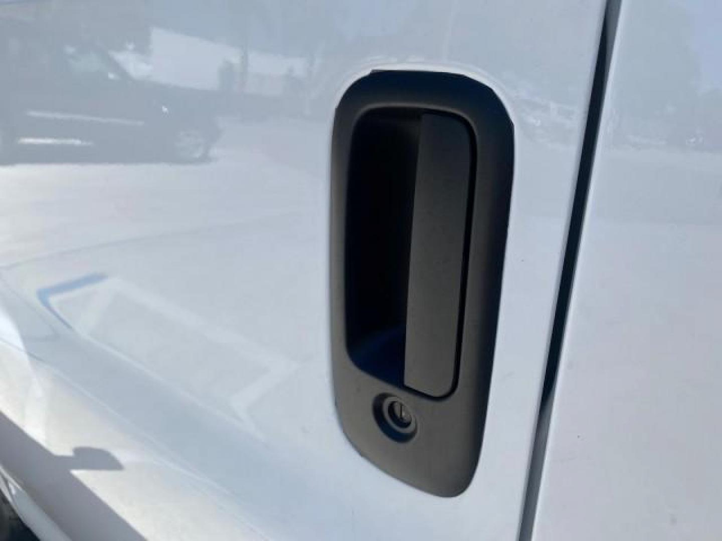 2004 Summit White /Medium Dark Pewter GMC Savana Cargo Van 1 OWNER FL (1GTFG15X141) with an 4.3L Vortec 4300 V6 MFI Engine engine, Automatic transmission, located at 4701 North Dixie Hwy, Pompano Beach, FL, 33064, (954) 422-2889, 26.240938, -80.123474 - OUR WEBPAGE FLORIDACARS1.COM HAS OVER 100 PHOTOS AND FREE CARFAX LINK 2004 GMC SAVANA 1500 THIS VAN IS LIKE NEW! VIN: 1GTFG15X141181482 1 G T F G 1 5 X 1 4 1 1 8 1 4 8 2 VAN 4.3L V6 F GASOLINE REAR WHEEL DRIVE Top Features Conversion Van Vinyl Seats Basic Features ABS Brakes AM/FM Stereo Air Conditi - Photo#28