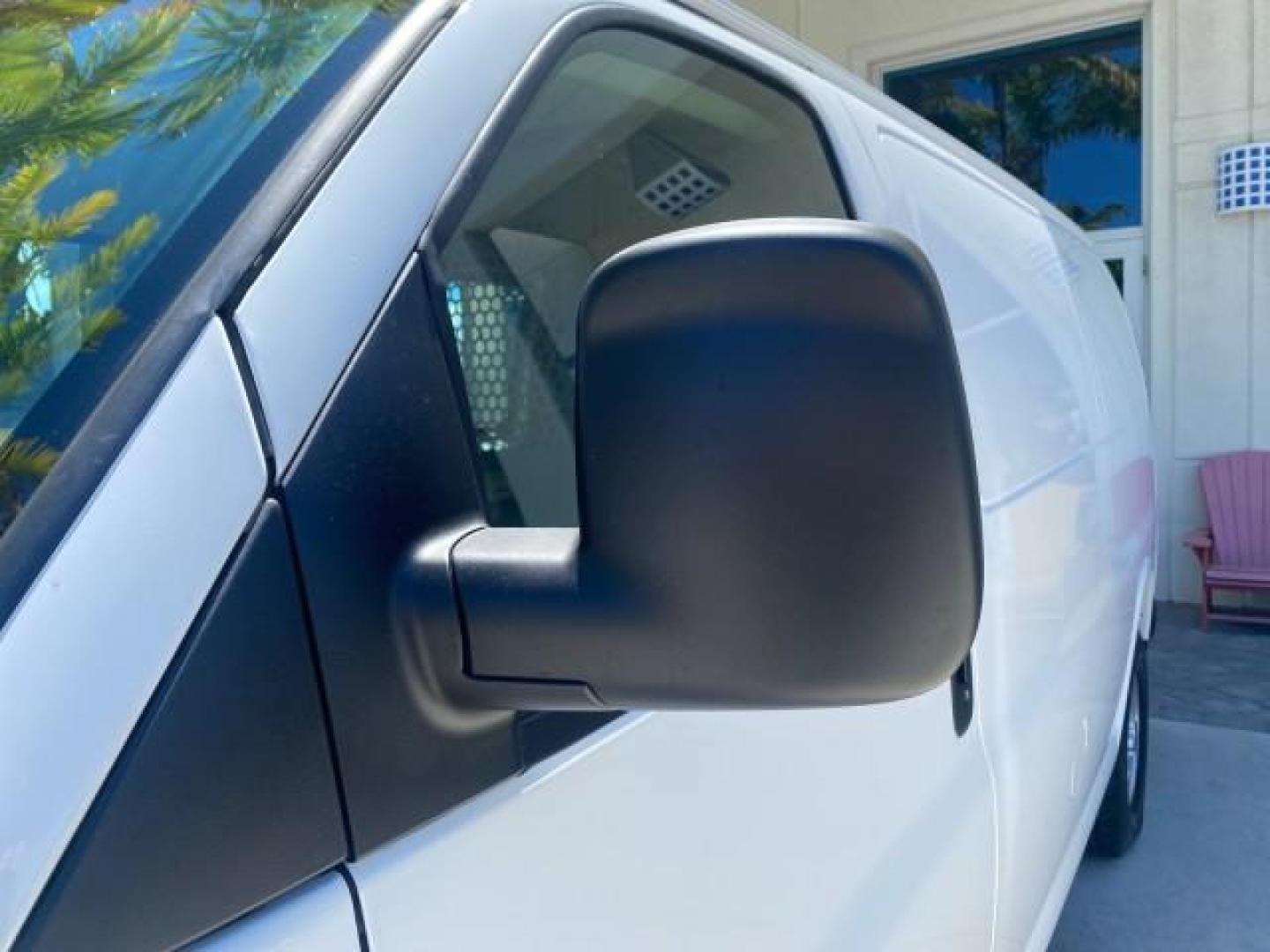 2004 Summit White /Medium Dark Pewter GMC Savana Cargo Van 1 OWNER FL (1GTFG15X141) with an 4.3L Vortec 4300 V6 MFI Engine engine, Automatic transmission, located at 4701 North Dixie Hwy, Pompano Beach, FL, 33064, (954) 422-2889, 26.240938, -80.123474 - OUR WEBPAGE FLORIDACARS1.COM HAS OVER 100 PHOTOS AND FREE CARFAX LINK 2004 GMC SAVANA 1500 THIS VAN IS LIKE NEW! VIN: 1GTFG15X141181482 1 G T F G 1 5 X 1 4 1 1 8 1 4 8 2 VAN 4.3L V6 F GASOLINE REAR WHEEL DRIVE Top Features Conversion Van Vinyl Seats Basic Features ABS Brakes AM/FM Stereo Air Conditi - Photo#30