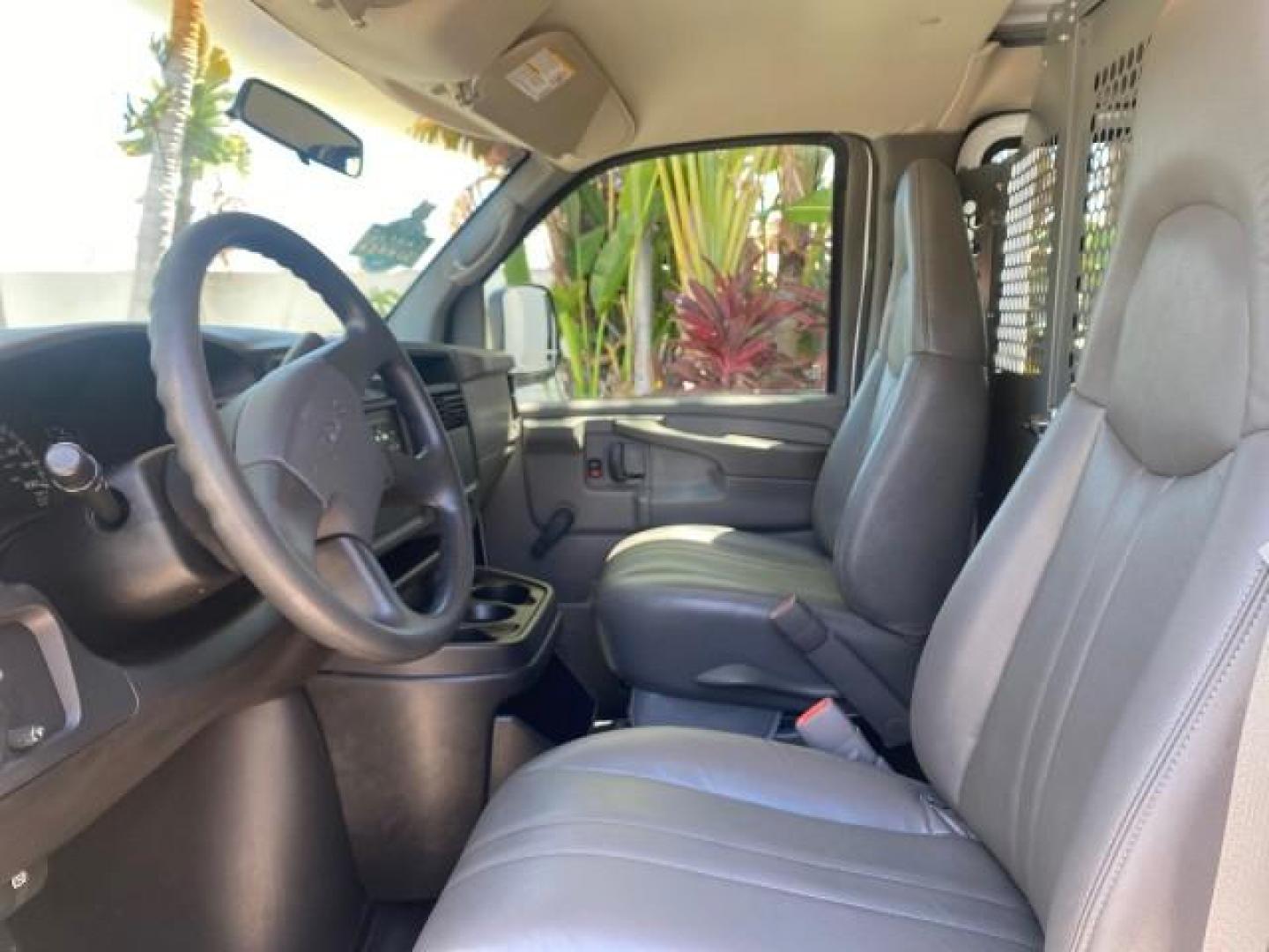2004 Summit White /Medium Dark Pewter GMC Savana Cargo Van 1 OWNER FL (1GTFG15X141) with an 4.3L Vortec 4300 V6 MFI Engine engine, Automatic transmission, located at 4701 North Dixie Hwy, Pompano Beach, FL, 33064, (954) 422-2889, 26.240938, -80.123474 - OUR WEBPAGE FLORIDACARS1.COM HAS OVER 100 PHOTOS AND FREE CARFAX LINK 2004 GMC SAVANA 1500 THIS VAN IS LIKE NEW! VIN: 1GTFG15X141181482 1 G T F G 1 5 X 1 4 1 1 8 1 4 8 2 VAN 4.3L V6 F GASOLINE REAR WHEEL DRIVE Top Features Conversion Van Vinyl Seats Basic Features ABS Brakes AM/FM Stereo Air Conditi - Photo#34