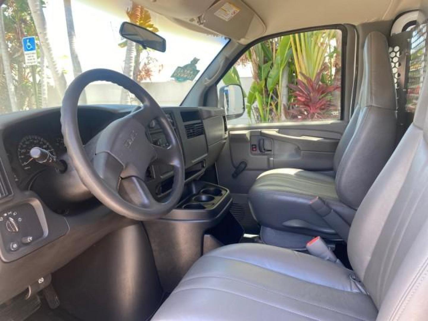 2004 Summit White /Medium Dark Pewter GMC Savana Cargo Van 1 OWNER FL (1GTFG15X141) with an 4.3L Vortec 4300 V6 MFI Engine engine, Automatic transmission, located at 4701 North Dixie Hwy, Pompano Beach, FL, 33064, (954) 422-2889, 26.240938, -80.123474 - OUR WEBPAGE FLORIDACARS1.COM HAS OVER 100 PHOTOS AND FREE CARFAX LINK 2004 GMC SAVANA 1500 THIS VAN IS LIKE NEW! VIN: 1GTFG15X141181482 1 G T F G 1 5 X 1 4 1 1 8 1 4 8 2 VAN 4.3L V6 F GASOLINE REAR WHEEL DRIVE Top Features Conversion Van Vinyl Seats Basic Features ABS Brakes AM/FM Stereo Air Conditi - Photo#35
