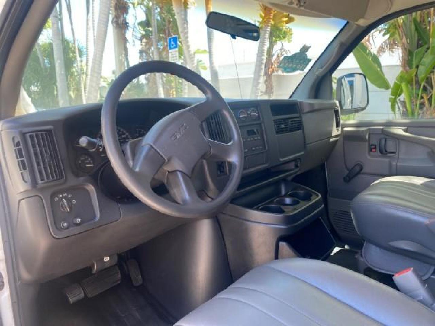 2004 Summit White /Medium Dark Pewter GMC Savana Cargo Van 1 OWNER FL (1GTFG15X141) with an 4.3L Vortec 4300 V6 MFI Engine engine, Automatic transmission, located at 4701 North Dixie Hwy, Pompano Beach, FL, 33064, (954) 422-2889, 26.240938, -80.123474 - OUR WEBPAGE FLORIDACARS1.COM HAS OVER 100 PHOTOS AND FREE CARFAX LINK 2004 GMC SAVANA 1500 THIS VAN IS LIKE NEW! VIN: 1GTFG15X141181482 1 G T F G 1 5 X 1 4 1 1 8 1 4 8 2 VAN 4.3L V6 F GASOLINE REAR WHEEL DRIVE Top Features Conversion Van Vinyl Seats Basic Features ABS Brakes AM/FM Stereo Air Conditi - Photo#37