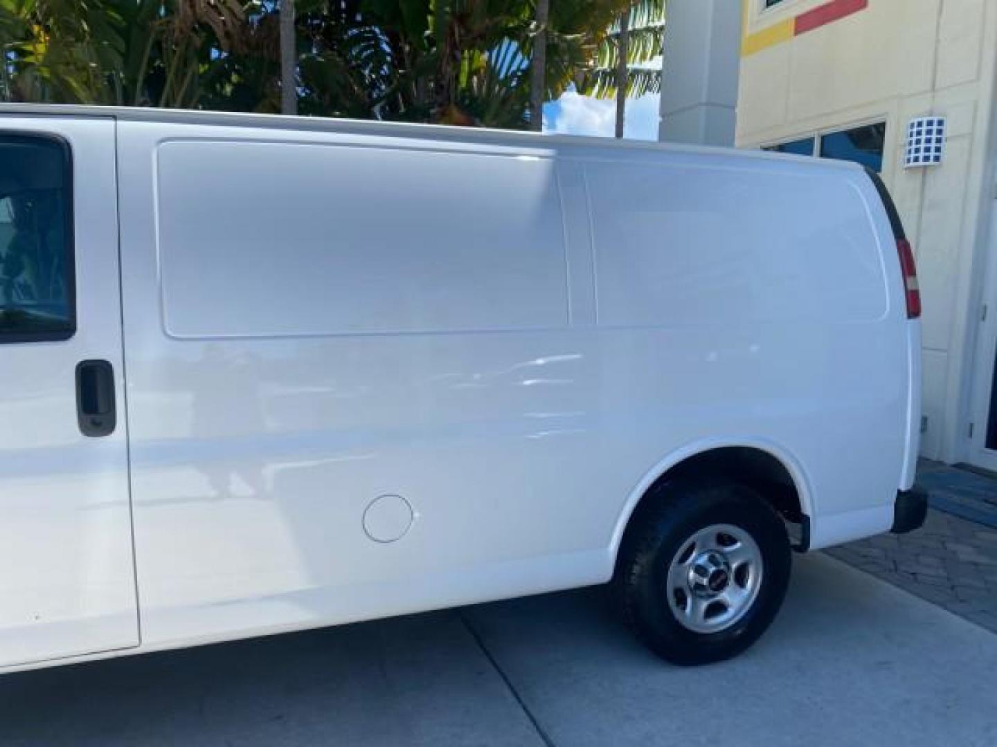2004 Summit White /Medium Dark Pewter GMC Savana Cargo Van 1 OWNER FL (1GTFG15X141) with an 4.3L Vortec 4300 V6 MFI Engine engine, Automatic transmission, located at 4701 North Dixie Hwy, Pompano Beach, FL, 33064, (954) 422-2889, 26.240938, -80.123474 - OUR WEBPAGE FLORIDACARS1.COM HAS OVER 100 PHOTOS AND FREE CARFAX LINK 2004 GMC SAVANA 1500 THIS VAN IS LIKE NEW! VIN: 1GTFG15X141181482 1 G T F G 1 5 X 1 4 1 1 8 1 4 8 2 VAN 4.3L V6 F GASOLINE REAR WHEEL DRIVE Top Features Conversion Van Vinyl Seats Basic Features ABS Brakes AM/FM Stereo Air Conditi - Photo#65