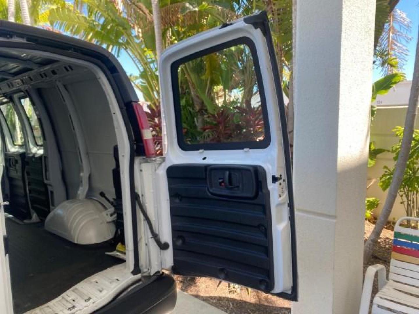 2004 Summit White /Medium Dark Pewter GMC Savana Cargo Van 1 OWNER FL (1GTFG15X141) with an 4.3L Vortec 4300 V6 MFI Engine engine, Automatic transmission, located at 4701 North Dixie Hwy, Pompano Beach, FL, 33064, (954) 422-2889, 26.240938, -80.123474 - OUR WEBPAGE FLORIDACARS1.COM HAS OVER 100 PHOTOS AND FREE CARFAX LINK 2004 GMC SAVANA 1500 THIS VAN IS LIKE NEW! VIN: 1GTFG15X141181482 1 G T F G 1 5 X 1 4 1 1 8 1 4 8 2 VAN 4.3L V6 F GASOLINE REAR WHEEL DRIVE Top Features Conversion Van Vinyl Seats Basic Features ABS Brakes AM/FM Stereo Air Conditi - Photo#76