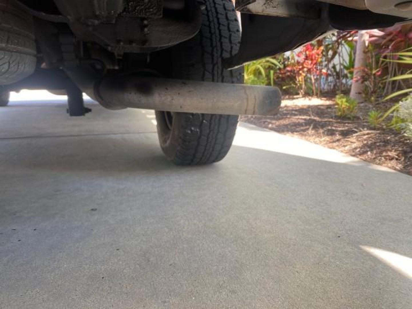 2004 Summit White /Medium Dark Pewter GMC Savana Cargo Van 1 OWNER FL (1GTFG15X141) with an 4.3L Vortec 4300 V6 MFI Engine engine, Automatic transmission, located at 4701 North Dixie Hwy, Pompano Beach, FL, 33064, (954) 422-2889, 26.240938, -80.123474 - OUR WEBPAGE FLORIDACARS1.COM HAS OVER 100 PHOTOS AND FREE CARFAX LINK 2004 GMC SAVANA 1500 THIS VAN IS LIKE NEW! VIN: 1GTFG15X141181482 1 G T F G 1 5 X 1 4 1 1 8 1 4 8 2 VAN 4.3L V6 F GASOLINE REAR WHEEL DRIVE Top Features Conversion Van Vinyl Seats Basic Features ABS Brakes AM/FM Stereo Air Conditi - Photo#82