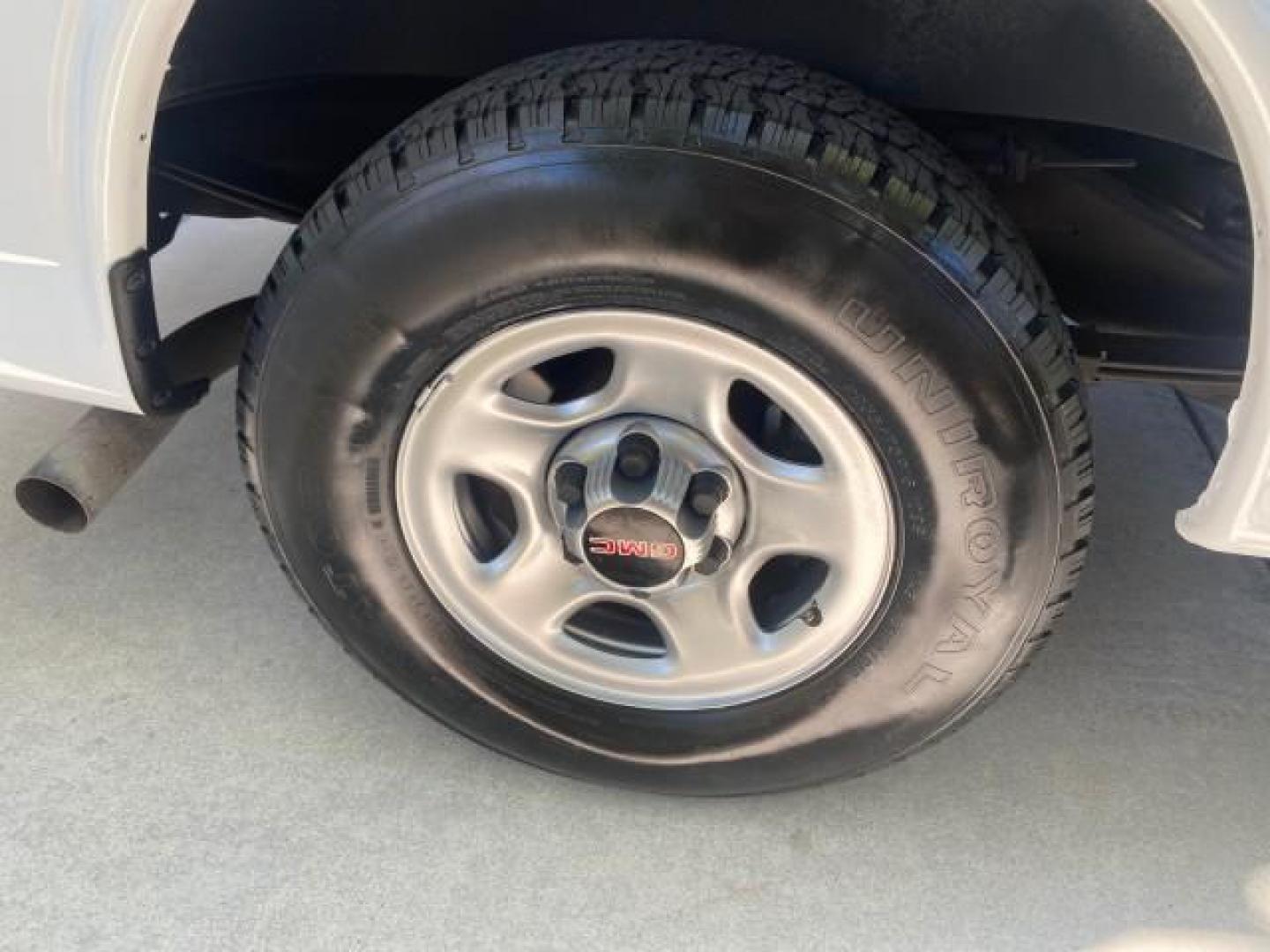 2004 Summit White /Medium Dark Pewter GMC Savana Cargo Van 1 OWNER FL (1GTFG15X141) with an 4.3L Vortec 4300 V6 MFI Engine engine, Automatic transmission, located at 4701 North Dixie Hwy, Pompano Beach, FL, 33064, (954) 422-2889, 26.240938, -80.123474 - OUR WEBPAGE FLORIDACARS1.COM HAS OVER 100 PHOTOS AND FREE CARFAX LINK 2004 GMC SAVANA 1500 THIS VAN IS LIKE NEW! VIN: 1GTFG15X141181482 1 G T F G 1 5 X 1 4 1 1 8 1 4 8 2 VAN 4.3L V6 F GASOLINE REAR WHEEL DRIVE Top Features Conversion Van Vinyl Seats Basic Features ABS Brakes AM/FM Stereo Air Conditi - Photo#83