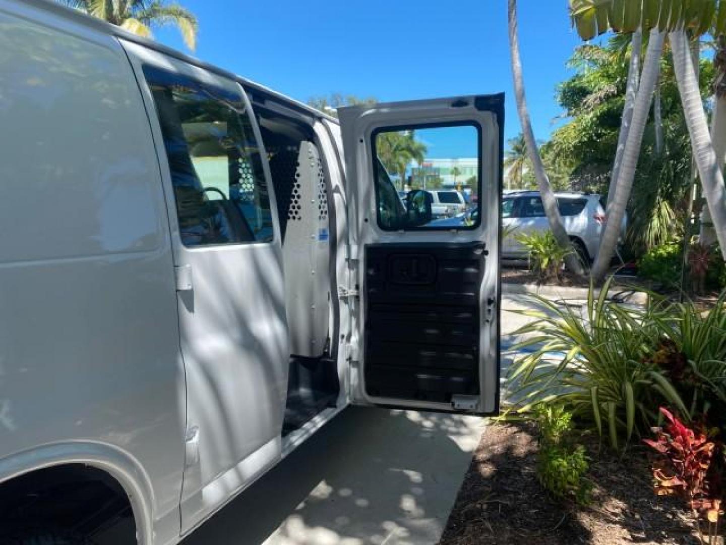 2004 Summit White /Medium Dark Pewter GMC Savana Cargo Van 1 OWNER FL (1GTFG15X141) with an 4.3L Vortec 4300 V6 MFI Engine engine, Automatic transmission, located at 4701 North Dixie Hwy, Pompano Beach, FL, 33064, (954) 422-2889, 26.240938, -80.123474 - OUR WEBPAGE FLORIDACARS1.COM HAS OVER 100 PHOTOS AND FREE CARFAX LINK 2004 GMC SAVANA 1500 THIS VAN IS LIKE NEW! VIN: 1GTFG15X141181482 1 G T F G 1 5 X 1 4 1 1 8 1 4 8 2 VAN 4.3L V6 F GASOLINE REAR WHEEL DRIVE Top Features Conversion Van Vinyl Seats Basic Features ABS Brakes AM/FM Stereo Air Conditi - Photo#86