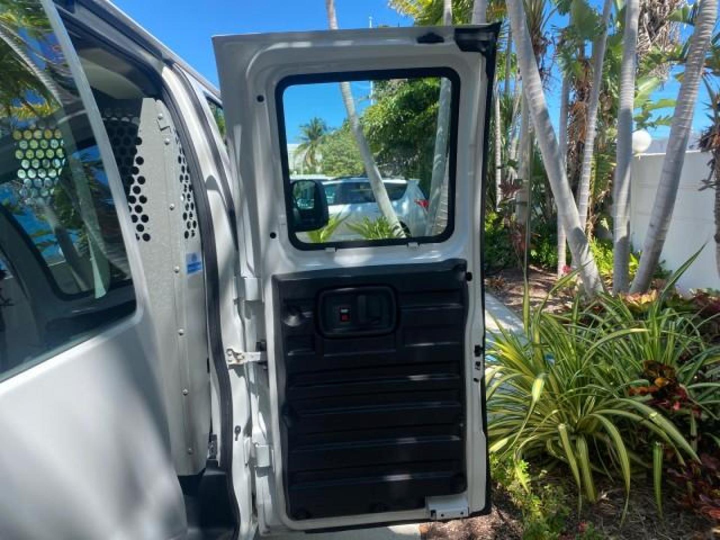 2004 Summit White /Medium Dark Pewter GMC Savana Cargo Van 1 OWNER FL (1GTFG15X141) with an 4.3L Vortec 4300 V6 MFI Engine engine, Automatic transmission, located at 4701 North Dixie Hwy, Pompano Beach, FL, 33064, (954) 422-2889, 26.240938, -80.123474 - OUR WEBPAGE FLORIDACARS1.COM HAS OVER 100 PHOTOS AND FREE CARFAX LINK 2004 GMC SAVANA 1500 THIS VAN IS LIKE NEW! VIN: 1GTFG15X141181482 1 G T F G 1 5 X 1 4 1 1 8 1 4 8 2 VAN 4.3L V6 F GASOLINE REAR WHEEL DRIVE Top Features Conversion Van Vinyl Seats Basic Features ABS Brakes AM/FM Stereo Air Conditi - Photo#87
