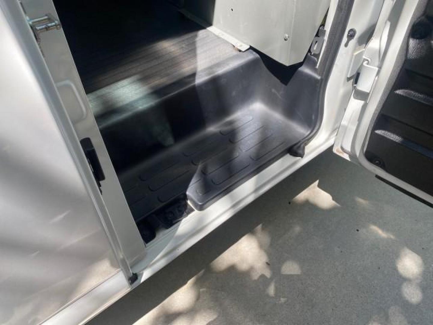 2004 Summit White /Medium Dark Pewter GMC Savana Cargo Van 1 OWNER FL (1GTFG15X141) with an 4.3L Vortec 4300 V6 MFI Engine engine, Automatic transmission, located at 4701 North Dixie Hwy, Pompano Beach, FL, 33064, (954) 422-2889, 26.240938, -80.123474 - OUR WEBPAGE FLORIDACARS1.COM HAS OVER 100 PHOTOS AND FREE CARFAX LINK 2004 GMC SAVANA 1500 THIS VAN IS LIKE NEW! VIN: 1GTFG15X141181482 1 G T F G 1 5 X 1 4 1 1 8 1 4 8 2 VAN 4.3L V6 F GASOLINE REAR WHEEL DRIVE Top Features Conversion Van Vinyl Seats Basic Features ABS Brakes AM/FM Stereo Air Conditi - Photo#88