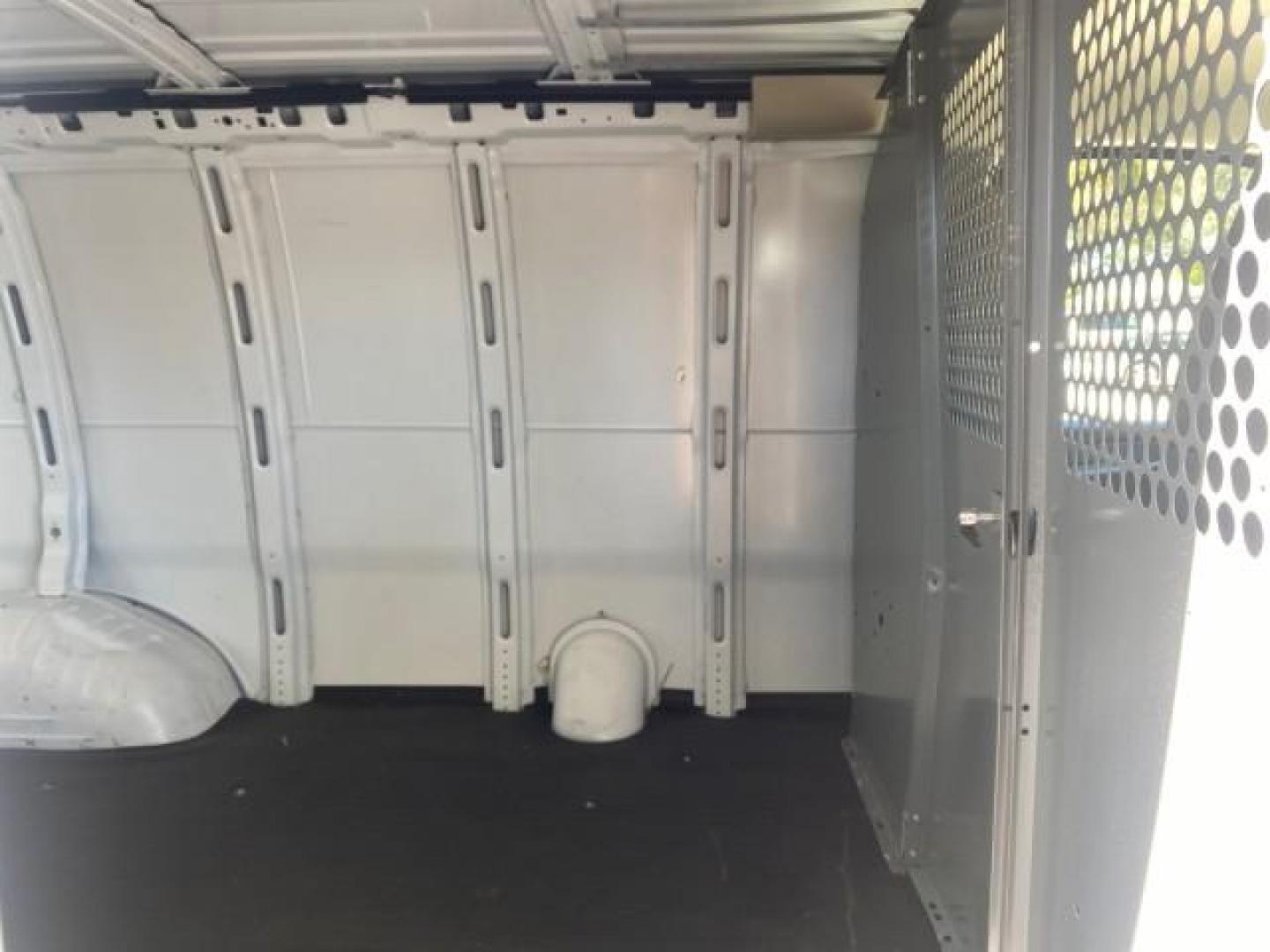 2004 Summit White /Medium Dark Pewter GMC Savana Cargo Van 1 OWNER FL (1GTFG15X141) with an 4.3L Vortec 4300 V6 MFI Engine engine, Automatic transmission, located at 4701 North Dixie Hwy, Pompano Beach, FL, 33064, (954) 422-2889, 26.240938, -80.123474 - OUR WEBPAGE FLORIDACARS1.COM HAS OVER 100 PHOTOS AND FREE CARFAX LINK 2004 GMC SAVANA 1500 THIS VAN IS LIKE NEW! VIN: 1GTFG15X141181482 1 G T F G 1 5 X 1 4 1 1 8 1 4 8 2 VAN 4.3L V6 F GASOLINE REAR WHEEL DRIVE Top Features Conversion Van Vinyl Seats Basic Features ABS Brakes AM/FM Stereo Air Conditi - Photo#91