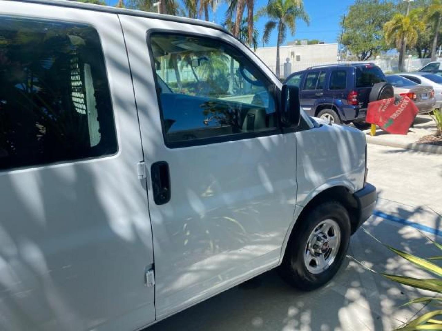 2004 Summit White /Medium Dark Pewter GMC Savana Cargo Van 1 OWNER FL (1GTFG15X141) with an 4.3L Vortec 4300 V6 MFI Engine engine, Automatic transmission, located at 4701 North Dixie Hwy, Pompano Beach, FL, 33064, (954) 422-2889, 26.240938, -80.123474 - OUR WEBPAGE FLORIDACARS1.COM HAS OVER 100 PHOTOS AND FREE CARFAX LINK 2004 GMC SAVANA 1500 THIS VAN IS LIKE NEW! VIN: 1GTFG15X141181482 1 G T F G 1 5 X 1 4 1 1 8 1 4 8 2 VAN 4.3L V6 F GASOLINE REAR WHEEL DRIVE Top Features Conversion Van Vinyl Seats Basic Features ABS Brakes AM/FM Stereo Air Conditi - Photo#99