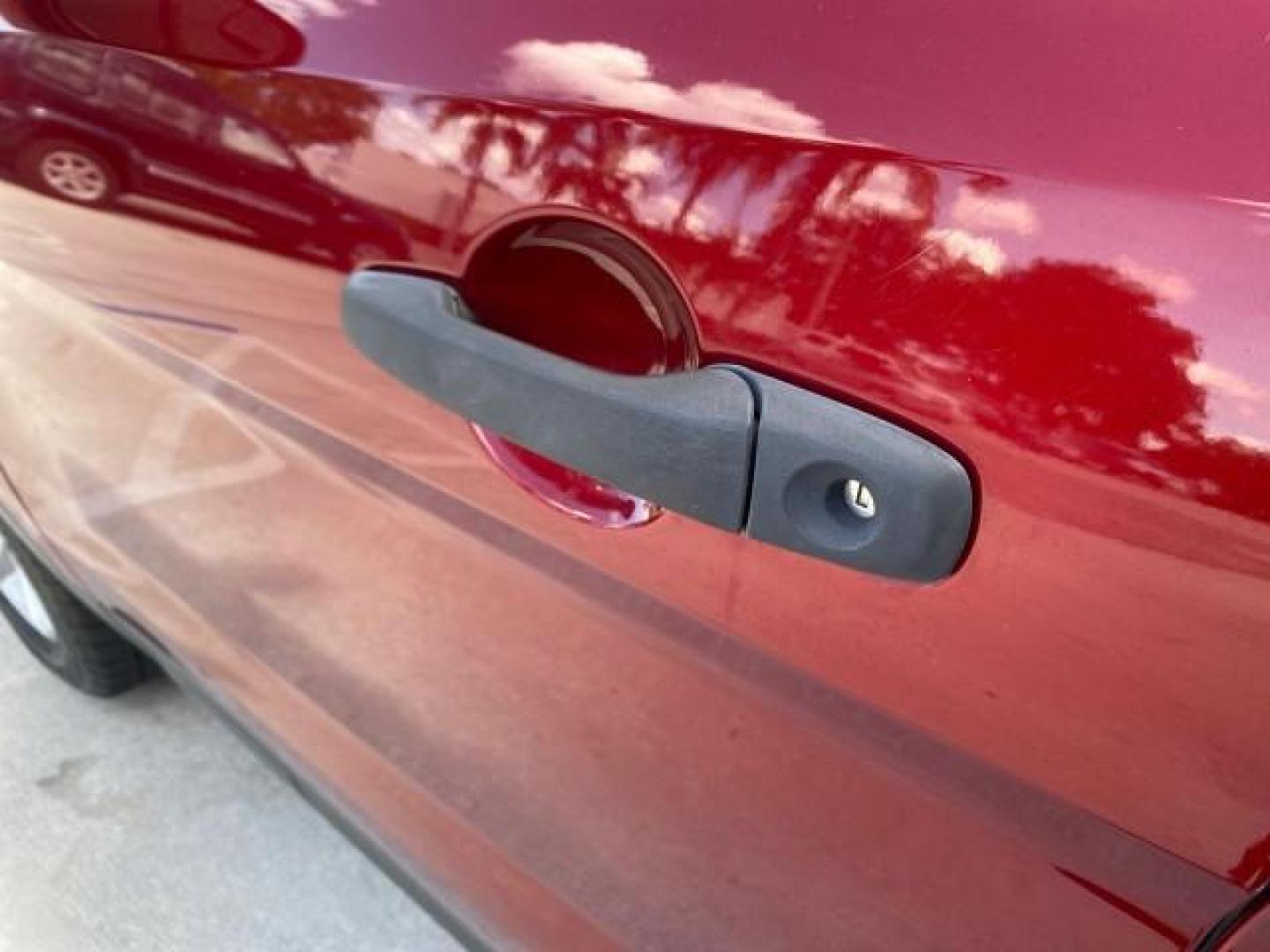 2016 Ruby Red Metallic Tinted Clearcoat /Medium Light Camel Ford Explorer LOW MILES 65,688 1 OWNER FL 3RD ROW (1FM5K7BH0GG) with an 2.3L 4-Cyl Engine engine, Automatic transmission, located at 4701 North Dixie Hwy, Pompano Beach, FL, 33064, (954) 422-2889, 26.240938, -80.123474 - OUR WEBPAGE FLORIDACARS1.COM HAS OVER 100 PHOTOS AND FREE CARFAX LINK 2016 FORD EXPLORER VIN: 1FM5K7BH0GGD22095 1 F M 5 K 7 B H 0 G G D 2 2 0 9 5 4 DOOR WAGON/SPORT UTILITY 2.3L I4 F DOHC 16V GASOLINE FRONT WHEEL DRIVE Features ABS Brakes Air Conditioning Alloy Wheels AM/FM Stereo Automatic Transmis - Photo#27
