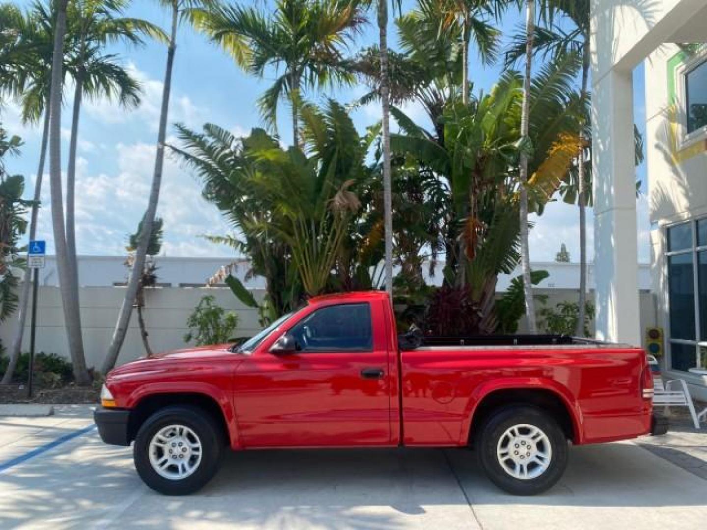 2004 Flame Red /Dark Slate Gray Dodge Dakota AC LOW MILES 25,008 (1D7FL16K04S) with an 3.7L SMPI V6 Magnum Engine engine, Automatic transmission, located at 4701 North Dixie Hwy, Pompano Beach, FL, 33064, (954) 422-2889, 26.240938, -80.123474 - OUR WEBPAGE FLORIDACARS1.COM HAS OVER 100 PHOTOS AND FREE CARFAX LINK 2004 DODGE DAKOTA VIN: 1D7FL16K04S664041 1 D 7 F L 1 6 K 0 4 S 6 6 4 0 4 1 PICKUP 3.7L V6 F GASOLINE REAR WHEEL DRIVE Top Features Alloy Wheels Bed Liner Cloth Seats Basic Features ABS Brakes AM/FM Stereo Air Conditioning Automati - Photo#4