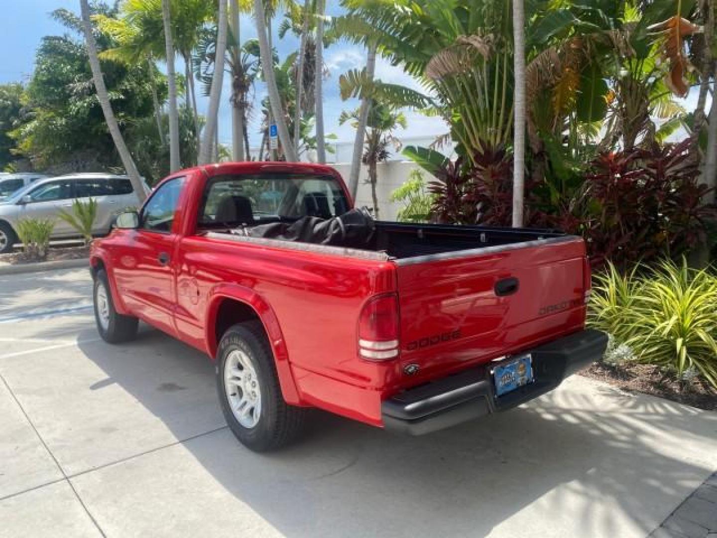 2004 Flame Red /Dark Slate Gray Dodge Dakota AC LOW MILES 25,008 (1D7FL16K04S) with an 3.7L SMPI V6 Magnum Engine engine, Automatic transmission, located at 4701 North Dixie Hwy, Pompano Beach, FL, 33064, (954) 422-2889, 26.240938, -80.123474 - OUR WEBPAGE FLORIDACARS1.COM HAS OVER 100 PHOTOS AND FREE CARFAX LINK 2004 DODGE DAKOTA VIN: 1D7FL16K04S664041 1 D 7 F L 1 6 K 0 4 S 6 6 4 0 4 1 PICKUP 3.7L V6 F GASOLINE REAR WHEEL DRIVE Top Features Alloy Wheels Bed Liner Cloth Seats Basic Features ABS Brakes AM/FM Stereo Air Conditioning Automati - Photo#5