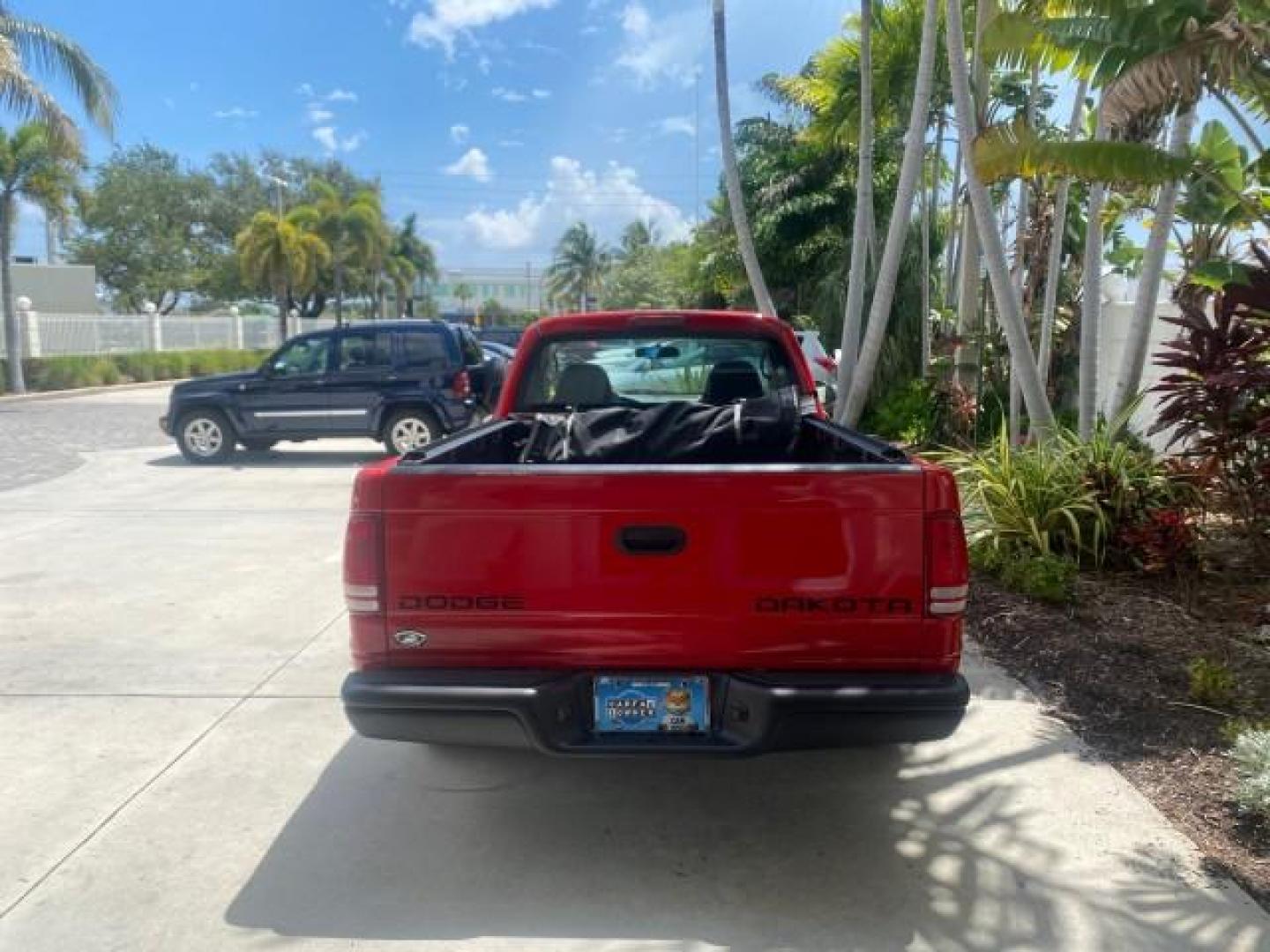 2004 Flame Red /Dark Slate Gray Dodge Dakota AC LOW MILES 25,008 (1D7FL16K04S) with an 3.7L SMPI V6 Magnum Engine engine, Automatic transmission, located at 4701 North Dixie Hwy, Pompano Beach, FL, 33064, (954) 422-2889, 26.240938, -80.123474 - OUR WEBPAGE FLORIDACARS1.COM HAS OVER 100 PHOTOS AND FREE CARFAX LINK 2004 DODGE DAKOTA VIN: 1D7FL16K04S664041 1 D 7 F L 1 6 K 0 4 S 6 6 4 0 4 1 PICKUP 3.7L V6 F GASOLINE REAR WHEEL DRIVE Top Features Alloy Wheels Bed Liner Cloth Seats Basic Features ABS Brakes AM/FM Stereo Air Conditioning Automati - Photo#6