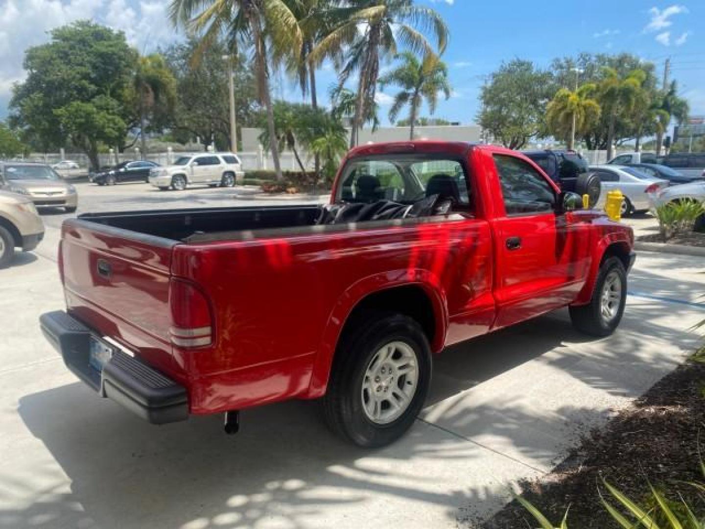 2004 Flame Red /Dark Slate Gray Dodge Dakota AC LOW MILES 25,008 (1D7FL16K04S) with an 3.7L SMPI V6 Magnum Engine engine, Automatic transmission, located at 4701 North Dixie Hwy, Pompano Beach, FL, 33064, (954) 422-2889, 26.240938, -80.123474 - OUR WEBPAGE FLORIDACARS1.COM HAS OVER 100 PHOTOS AND FREE CARFAX LINK 2004 DODGE DAKOTA VIN: 1D7FL16K04S664041 1 D 7 F L 1 6 K 0 4 S 6 6 4 0 4 1 PICKUP 3.7L V6 F GASOLINE REAR WHEEL DRIVE Top Features Alloy Wheels Bed Liner Cloth Seats Basic Features ABS Brakes AM/FM Stereo Air Conditioning Automati - Photo#7