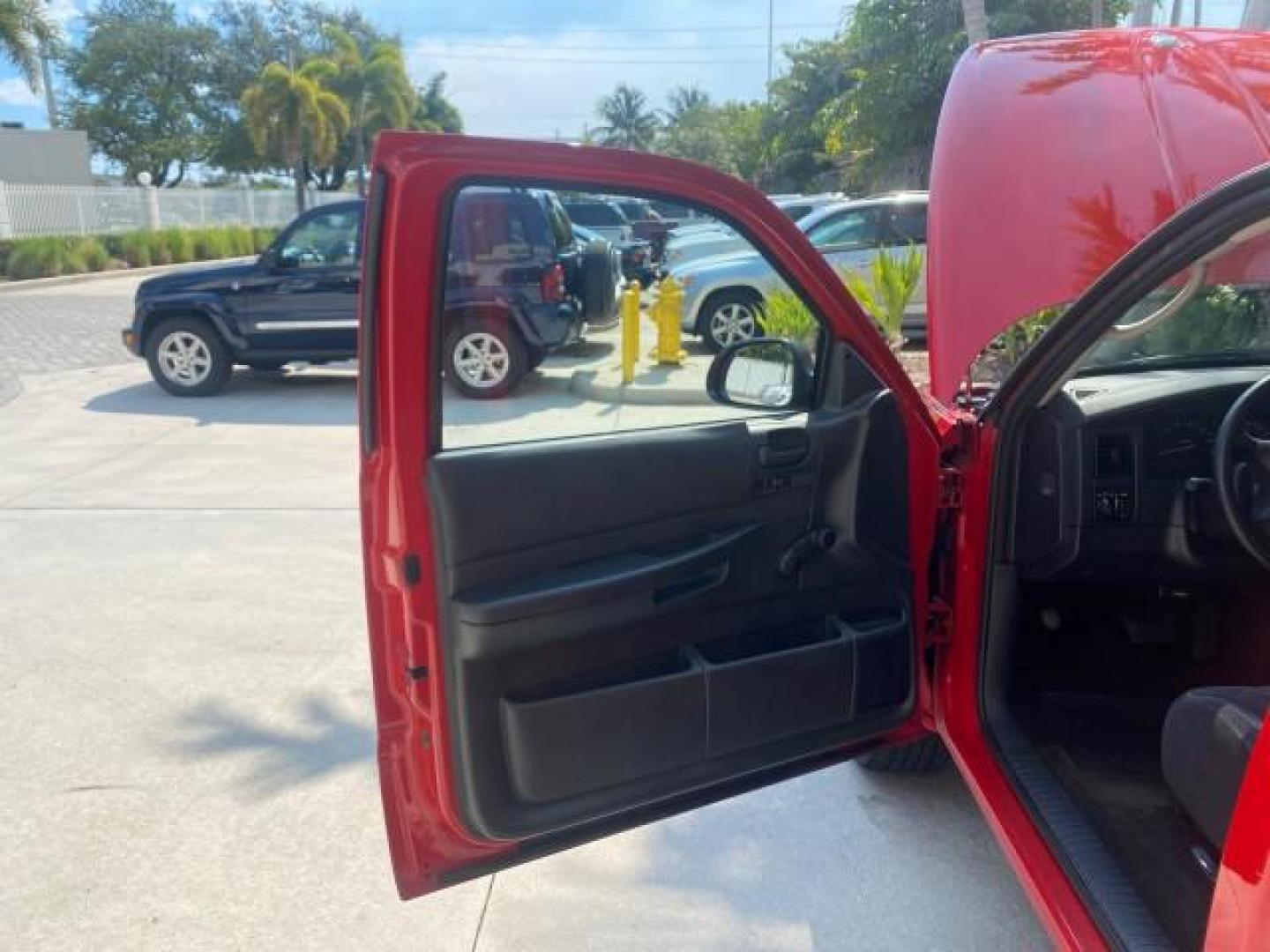 2004 Flame Red /Dark Slate Gray Dodge Dakota AC LOW MILES 25,008 (1D7FL16K04S) with an 3.7L SMPI V6 Magnum Engine engine, Automatic transmission, located at 4701 North Dixie Hwy, Pompano Beach, FL, 33064, (954) 422-2889, 26.240938, -80.123474 - OUR WEBPAGE FLORIDACARS1.COM HAS OVER 100 PHOTOS AND FREE CARFAX LINK 2004 DODGE DAKOTA VIN: 1D7FL16K04S664041 1 D 7 F L 1 6 K 0 4 S 6 6 4 0 4 1 PICKUP 3.7L V6 F GASOLINE REAR WHEEL DRIVE Top Features Alloy Wheels Bed Liner Cloth Seats Basic Features ABS Brakes AM/FM Stereo Air Conditioning Automati - Photo#9
