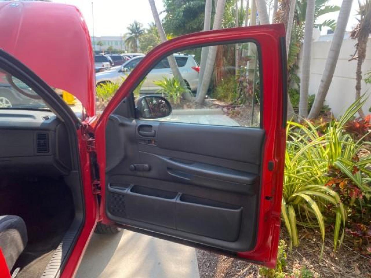 2004 Flame Red /Dark Slate Gray Dodge Dakota AC LOW MILES 25,008 (1D7FL16K04S) with an 3.7L SMPI V6 Magnum Engine engine, Automatic transmission, located at 4701 North Dixie Hwy, Pompano Beach, FL, 33064, (954) 422-2889, 26.240938, -80.123474 - OUR WEBPAGE FLORIDACARS1.COM HAS OVER 100 PHOTOS AND FREE CARFAX LINK 2004 DODGE DAKOTA VIN: 1D7FL16K04S664041 1 D 7 F L 1 6 K 0 4 S 6 6 4 0 4 1 PICKUP 3.7L V6 F GASOLINE REAR WHEEL DRIVE Top Features Alloy Wheels Bed Liner Cloth Seats Basic Features ABS Brakes AM/FM Stereo Air Conditioning Automati - Photo#11