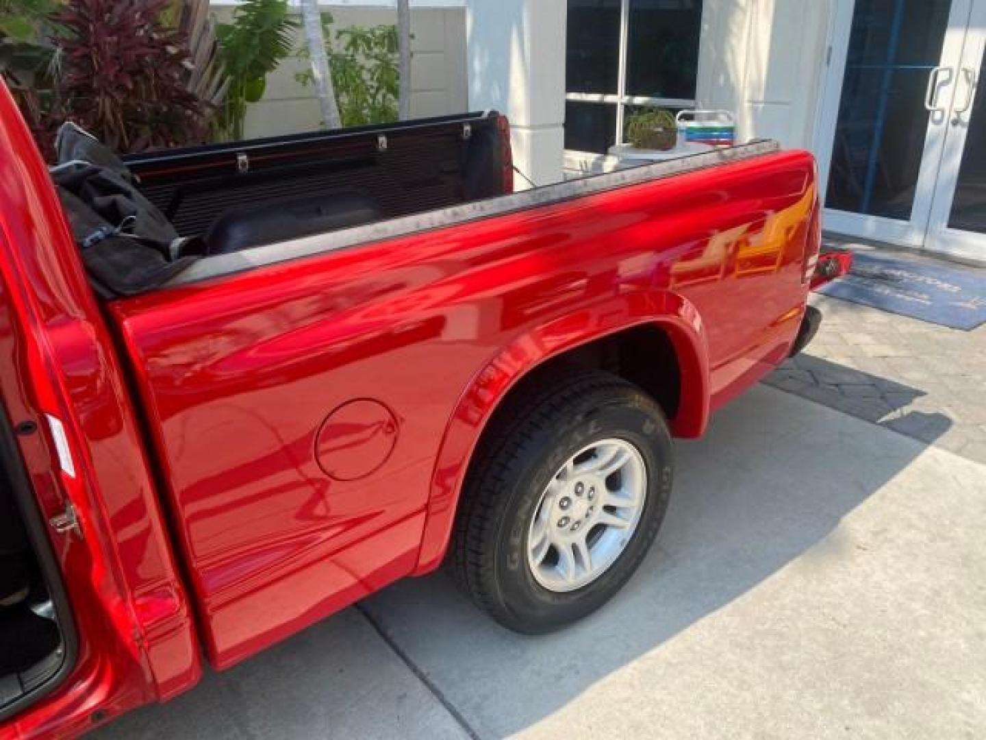 2004 Flame Red /Dark Slate Gray Dodge Dakota AC LOW MILES 25,008 (1D7FL16K04S) with an 3.7L SMPI V6 Magnum Engine engine, Automatic transmission, located at 4701 North Dixie Hwy, Pompano Beach, FL, 33064, (954) 422-2889, 26.240938, -80.123474 - OUR WEBPAGE FLORIDACARS1.COM HAS OVER 100 PHOTOS AND FREE CARFAX LINK 2004 DODGE DAKOTA VIN: 1D7FL16K04S664041 1 D 7 F L 1 6 K 0 4 S 6 6 4 0 4 1 PICKUP 3.7L V6 F GASOLINE REAR WHEEL DRIVE Top Features Alloy Wheels Bed Liner Cloth Seats Basic Features ABS Brakes AM/FM Stereo Air Conditioning Automati - Photo#13