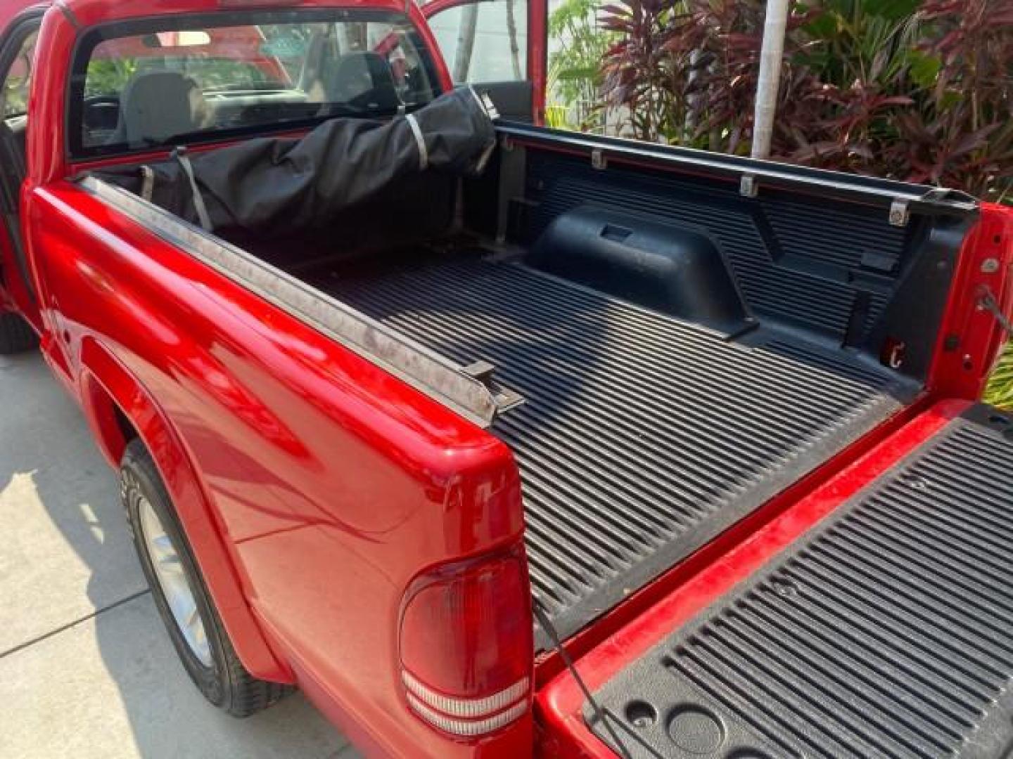 2004 Flame Red /Dark Slate Gray Dodge Dakota AC LOW MILES 25,008 (1D7FL16K04S) with an 3.7L SMPI V6 Magnum Engine engine, Automatic transmission, located at 4701 North Dixie Hwy, Pompano Beach, FL, 33064, (954) 422-2889, 26.240938, -80.123474 - OUR WEBPAGE FLORIDACARS1.COM HAS OVER 100 PHOTOS AND FREE CARFAX LINK 2004 DODGE DAKOTA VIN: 1D7FL16K04S664041 1 D 7 F L 1 6 K 0 4 S 6 6 4 0 4 1 PICKUP 3.7L V6 F GASOLINE REAR WHEEL DRIVE Top Features Alloy Wheels Bed Liner Cloth Seats Basic Features ABS Brakes AM/FM Stereo Air Conditioning Automati - Photo#14