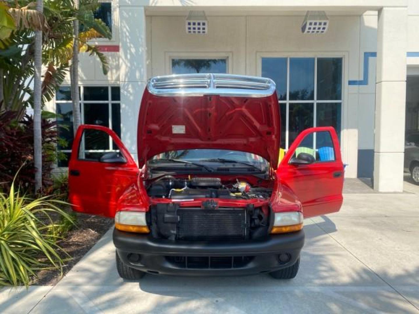 2004 Flame Red /Dark Slate Gray Dodge Dakota AC LOW MILES 25,008 (1D7FL16K04S) with an 3.7L SMPI V6 Magnum Engine engine, Automatic transmission, located at 4701 North Dixie Hwy, Pompano Beach, FL, 33064, (954) 422-2889, 26.240938, -80.123474 - OUR WEBPAGE FLORIDACARS1.COM HAS OVER 100 PHOTOS AND FREE CARFAX LINK 2004 DODGE DAKOTA VIN: 1D7FL16K04S664041 1 D 7 F L 1 6 K 0 4 S 6 6 4 0 4 1 PICKUP 3.7L V6 F GASOLINE REAR WHEEL DRIVE Top Features Alloy Wheels Bed Liner Cloth Seats Basic Features ABS Brakes AM/FM Stereo Air Conditioning Automati - Photo#16