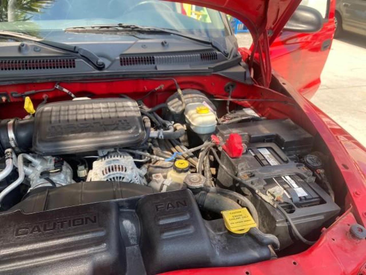 2004 Flame Red /Dark Slate Gray Dodge Dakota AC LOW MILES 25,008 (1D7FL16K04S) with an 3.7L SMPI V6 Magnum Engine engine, Automatic transmission, located at 4701 North Dixie Hwy, Pompano Beach, FL, 33064, (954) 422-2889, 26.240938, -80.123474 - OUR WEBPAGE FLORIDACARS1.COM HAS OVER 100 PHOTOS AND FREE CARFAX LINK 2004 DODGE DAKOTA VIN: 1D7FL16K04S664041 1 D 7 F L 1 6 K 0 4 S 6 6 4 0 4 1 PICKUP 3.7L V6 F GASOLINE REAR WHEEL DRIVE Top Features Alloy Wheels Bed Liner Cloth Seats Basic Features ABS Brakes AM/FM Stereo Air Conditioning Automati - Photo#26