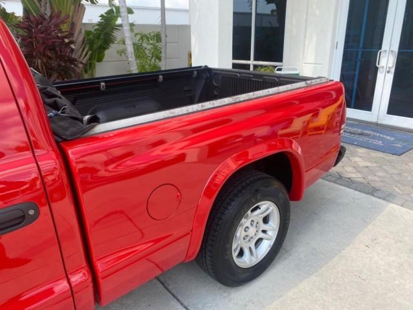 2004 Flame Red /Dark Slate Gray Dodge Dakota AC LOW MILES 25,008 (1D7FL16K04S) with an 3.7L SMPI V6 Magnum Engine engine, Automatic transmission, located at 4701 North Dixie Hwy, Pompano Beach, FL, 33064, (954) 422-2889, 26.240938, -80.123474 - OUR WEBPAGE FLORIDACARS1.COM HAS OVER 100 PHOTOS AND FREE CARFAX LINK 2004 DODGE DAKOTA VIN: 1D7FL16K04S664041 1 D 7 F L 1 6 K 0 4 S 6 6 4 0 4 1 PICKUP 3.7L V6 F GASOLINE REAR WHEEL DRIVE Top Features Alloy Wheels Bed Liner Cloth Seats Basic Features ABS Brakes AM/FM Stereo Air Conditioning Automati - Photo#56