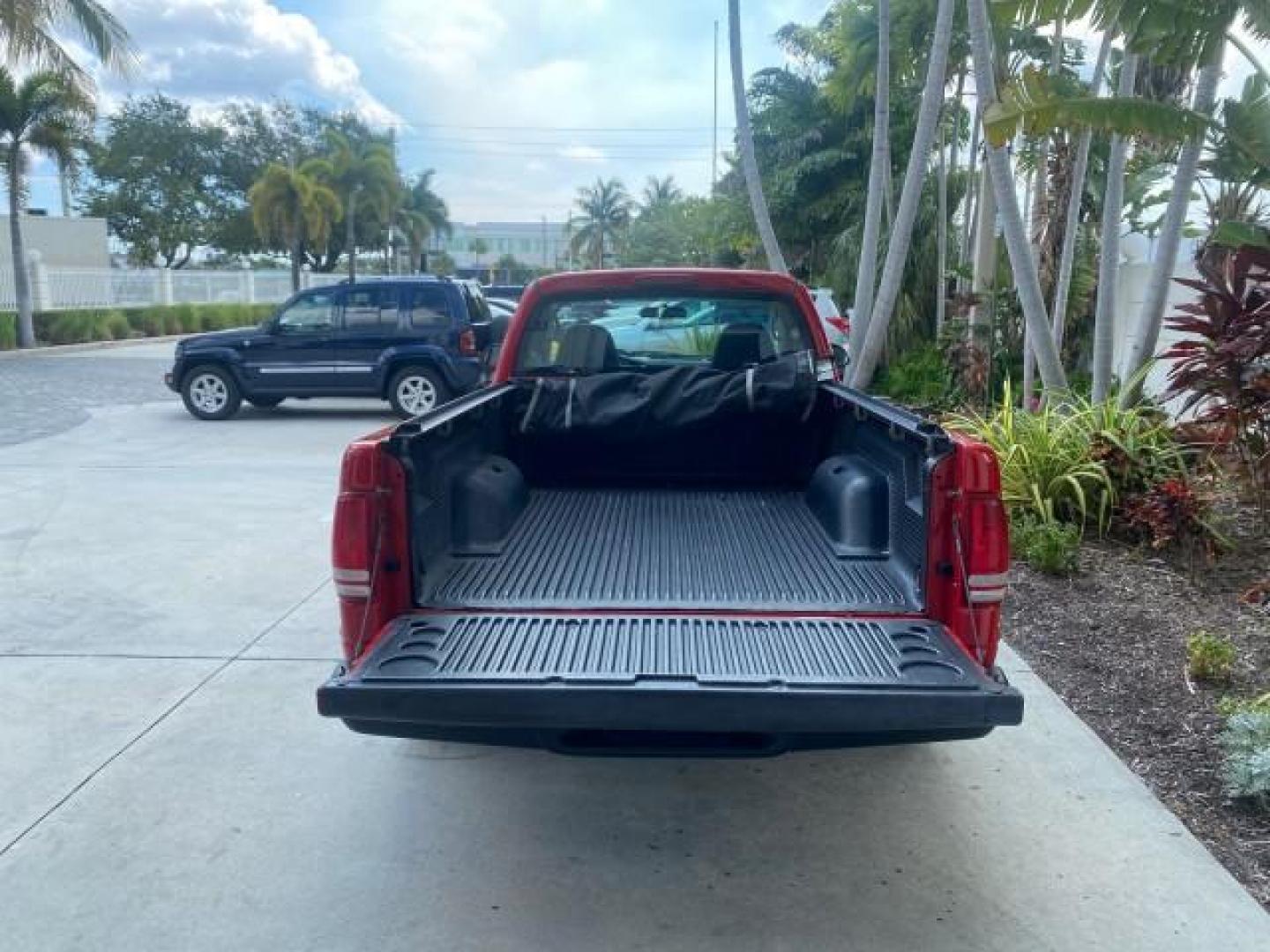 2004 Flame Red /Dark Slate Gray Dodge Dakota AC LOW MILES 25,008 (1D7FL16K04S) with an 3.7L SMPI V6 Magnum Engine engine, Automatic transmission, located at 4701 North Dixie Hwy, Pompano Beach, FL, 33064, (954) 422-2889, 26.240938, -80.123474 - OUR WEBPAGE FLORIDACARS1.COM HAS OVER 100 PHOTOS AND FREE CARFAX LINK 2004 DODGE DAKOTA VIN: 1D7FL16K04S664041 1 D 7 F L 1 6 K 0 4 S 6 6 4 0 4 1 PICKUP 3.7L V6 F GASOLINE REAR WHEEL DRIVE Top Features Alloy Wheels Bed Liner Cloth Seats Basic Features ABS Brakes AM/FM Stereo Air Conditioning Automati - Photo#64