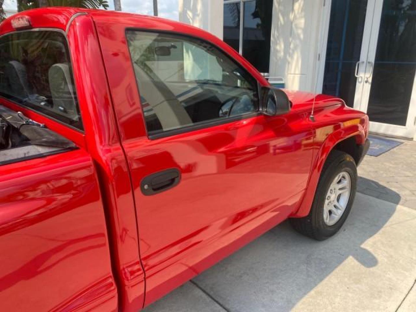 2004 Flame Red /Dark Slate Gray Dodge Dakota AC LOW MILES 25,008 (1D7FL16K04S) with an 3.7L SMPI V6 Magnum Engine engine, Automatic transmission, located at 4701 North Dixie Hwy, Pompano Beach, FL, 33064, (954) 422-2889, 26.240938, -80.123474 - OUR WEBPAGE FLORIDACARS1.COM HAS OVER 100 PHOTOS AND FREE CARFAX LINK 2004 DODGE DAKOTA VIN: 1D7FL16K04S664041 1 D 7 F L 1 6 K 0 4 S 6 6 4 0 4 1 PICKUP 3.7L V6 F GASOLINE REAR WHEEL DRIVE Top Features Alloy Wheels Bed Liner Cloth Seats Basic Features ABS Brakes AM/FM Stereo Air Conditioning Automati - Photo#69