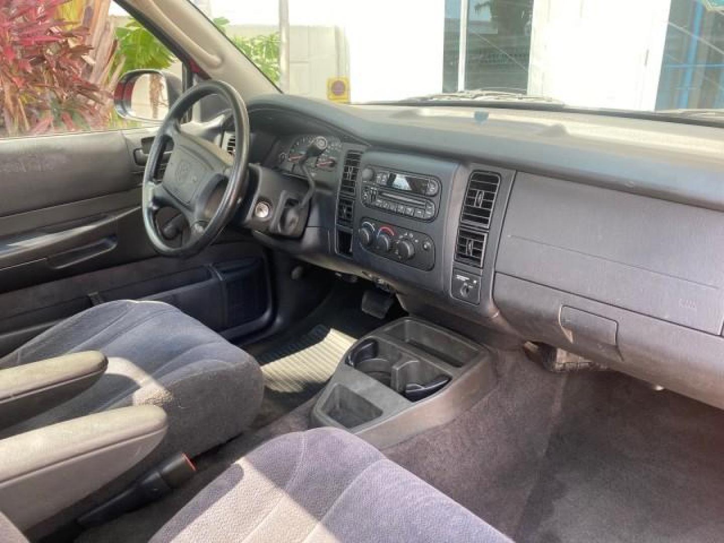 2004 Flame Red /Dark Slate Gray Dodge Dakota AC LOW MILES 25,008 (1D7FL16K04S) with an 3.7L SMPI V6 Magnum Engine engine, Automatic transmission, located at 4701 North Dixie Hwy, Pompano Beach, FL, 33064, (954) 422-2889, 26.240938, -80.123474 - OUR WEBPAGE FLORIDACARS1.COM HAS OVER 100 PHOTOS AND FREE CARFAX LINK 2004 DODGE DAKOTA VIN: 1D7FL16K04S664041 1 D 7 F L 1 6 K 0 4 S 6 6 4 0 4 1 PICKUP 3.7L V6 F GASOLINE REAR WHEEL DRIVE Top Features Alloy Wheels Bed Liner Cloth Seats Basic Features ABS Brakes AM/FM Stereo Air Conditioning Automati - Photo#77