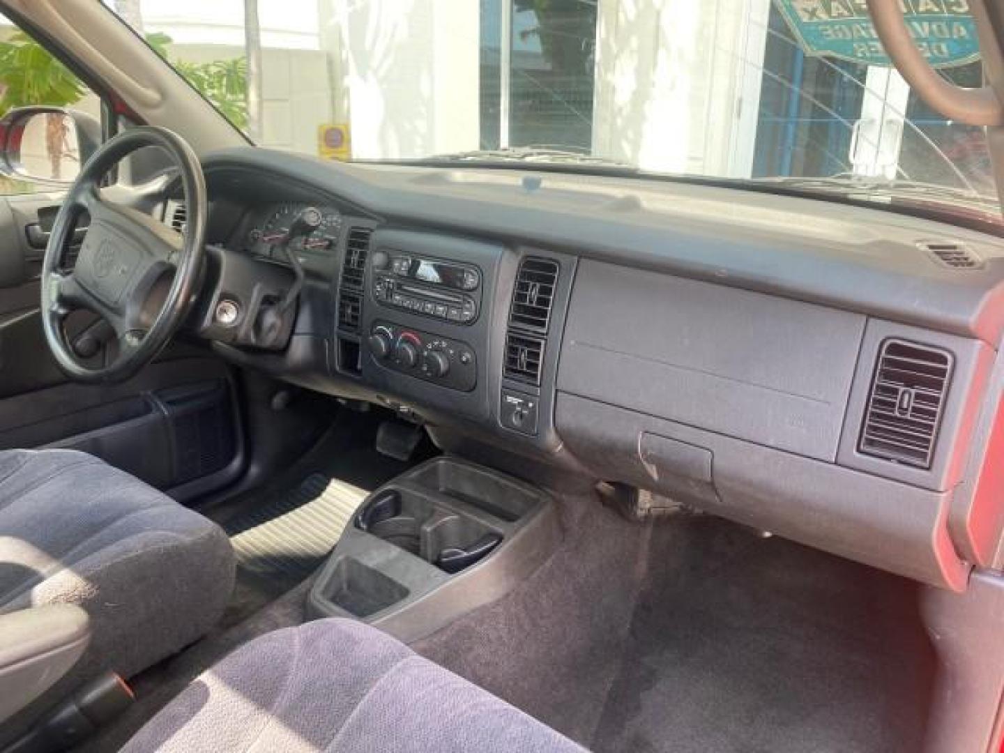 2004 Flame Red /Dark Slate Gray Dodge Dakota AC LOW MILES 25,008 (1D7FL16K04S) with an 3.7L SMPI V6 Magnum Engine engine, Automatic transmission, located at 4701 North Dixie Hwy, Pompano Beach, FL, 33064, (954) 422-2889, 26.240938, -80.123474 - OUR WEBPAGE FLORIDACARS1.COM HAS OVER 100 PHOTOS AND FREE CARFAX LINK 2004 DODGE DAKOTA VIN: 1D7FL16K04S664041 1 D 7 F L 1 6 K 0 4 S 6 6 4 0 4 1 PICKUP 3.7L V6 F GASOLINE REAR WHEEL DRIVE Top Features Alloy Wheels Bed Liner Cloth Seats Basic Features ABS Brakes AM/FM Stereo Air Conditioning Automati - Photo#78