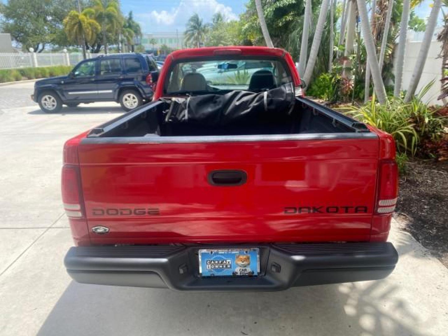2004 Flame Red /Dark Slate Gray Dodge Dakota AC LOW MILES 25,008 (1D7FL16K04S) with an 3.7L SMPI V6 Magnum Engine engine, Automatic transmission, located at 4701 North Dixie Hwy, Pompano Beach, FL, 33064, (954) 422-2889, 26.240938, -80.123474 - OUR WEBPAGE FLORIDACARS1.COM HAS OVER 100 PHOTOS AND FREE CARFAX LINK 2004 DODGE DAKOTA VIN: 1D7FL16K04S664041 1 D 7 F L 1 6 K 0 4 S 6 6 4 0 4 1 PICKUP 3.7L V6 F GASOLINE REAR WHEEL DRIVE Top Features Alloy Wheels Bed Liner Cloth Seats Basic Features ABS Brakes AM/FM Stereo Air Conditioning Automati - Photo#86