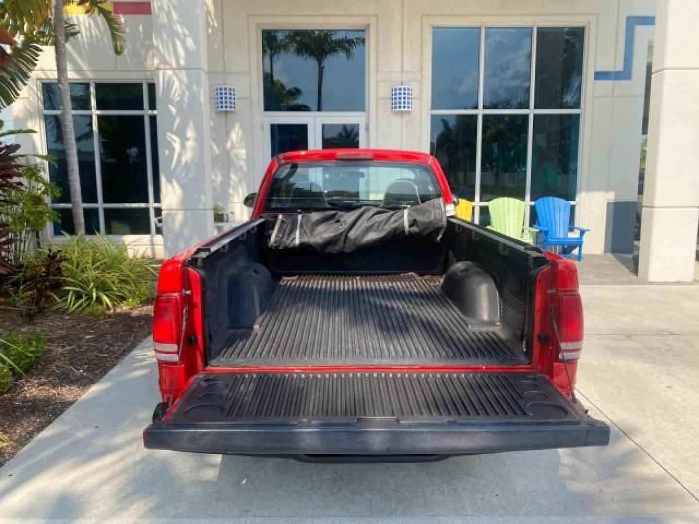 2004 Flame Red /Dark Slate Gray Dodge Dakota AC LOW MILES 25,008 (1D7FL16K04S) with an 3.7L SMPI V6 Magnum Engine engine, Automatic transmission, located at 4701 North Dixie Hwy, Pompano Beach, FL, 33064, (954) 422-2889, 26.240938, -80.123474 - OUR WEBPAGE FLORIDACARS1.COM HAS OVER 100 PHOTOS AND FREE CARFAX LINK 2004 DODGE DAKOTA VIN: 1D7FL16K04S664041 1 D 7 F L 1 6 K 0 4 S 6 6 4 0 4 1 PICKUP 3.7L V6 F GASOLINE REAR WHEEL DRIVE Top Features Alloy Wheels Bed Liner Cloth Seats Basic Features ABS Brakes AM/FM Stereo Air Conditioning Automati - Photo#87