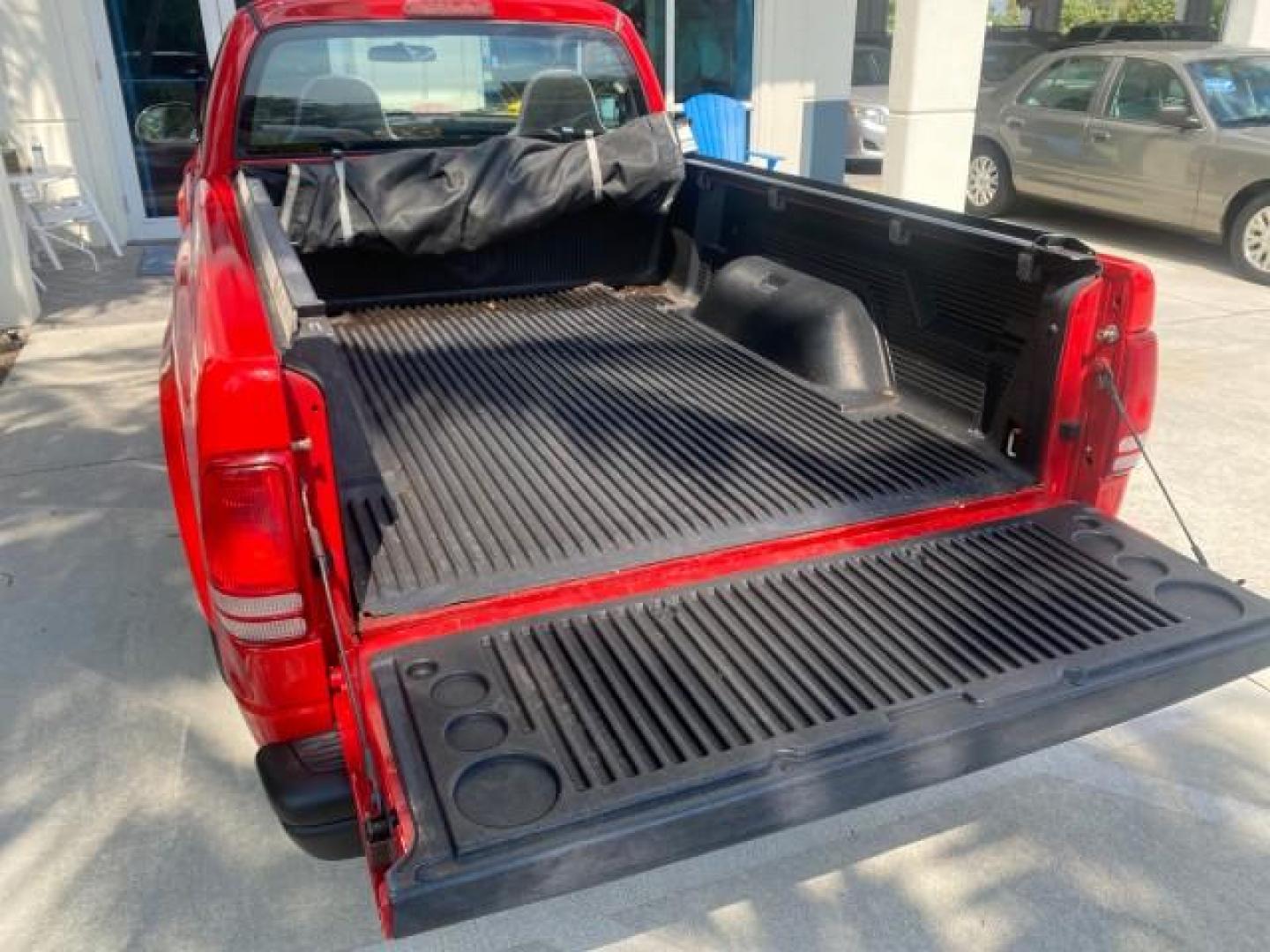 2004 Flame Red /Dark Slate Gray Dodge Dakota AC LOW MILES 25,008 (1D7FL16K04S) with an 3.7L SMPI V6 Magnum Engine engine, Automatic transmission, located at 4701 North Dixie Hwy, Pompano Beach, FL, 33064, (954) 422-2889, 26.240938, -80.123474 - OUR WEBPAGE FLORIDACARS1.COM HAS OVER 100 PHOTOS AND FREE CARFAX LINK 2004 DODGE DAKOTA VIN: 1D7FL16K04S664041 1 D 7 F L 1 6 K 0 4 S 6 6 4 0 4 1 PICKUP 3.7L V6 F GASOLINE REAR WHEEL DRIVE Top Features Alloy Wheels Bed Liner Cloth Seats Basic Features ABS Brakes AM/FM Stereo Air Conditioning Automati - Photo#88