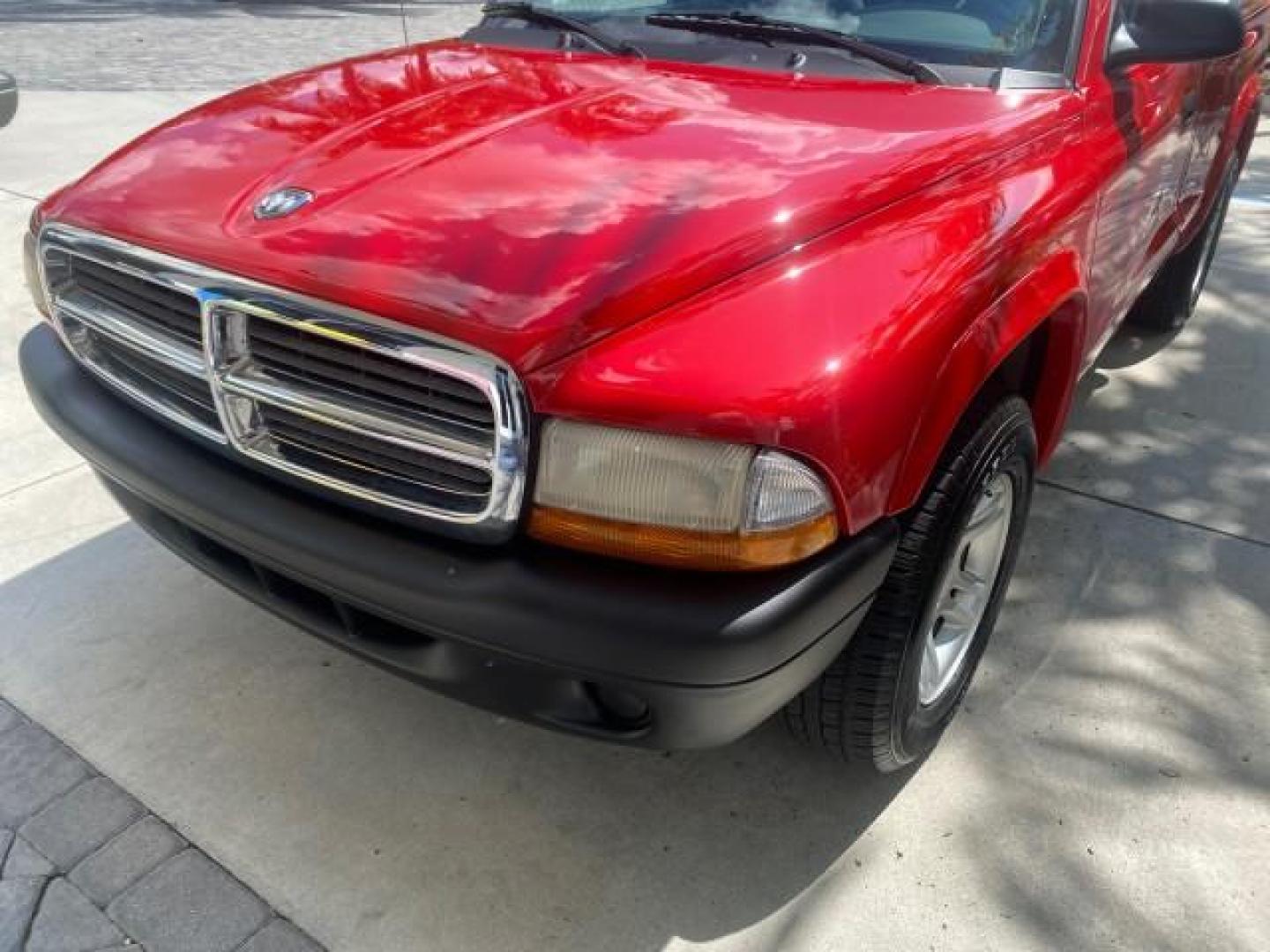 2004 Flame Red /Dark Slate Gray Dodge Dakota AC LOW MILES 25,008 (1D7FL16K04S) with an 3.7L SMPI V6 Magnum Engine engine, Automatic transmission, located at 4701 North Dixie Hwy, Pompano Beach, FL, 33064, (954) 422-2889, 26.240938, -80.123474 - OUR WEBPAGE FLORIDACARS1.COM HAS OVER 100 PHOTOS AND FREE CARFAX LINK 2004 DODGE DAKOTA VIN: 1D7FL16K04S664041 1 D 7 F L 1 6 K 0 4 S 6 6 4 0 4 1 PICKUP 3.7L V6 F GASOLINE REAR WHEEL DRIVE Top Features Alloy Wheels Bed Liner Cloth Seats Basic Features ABS Brakes AM/FM Stereo Air Conditioning Automati - Photo#97