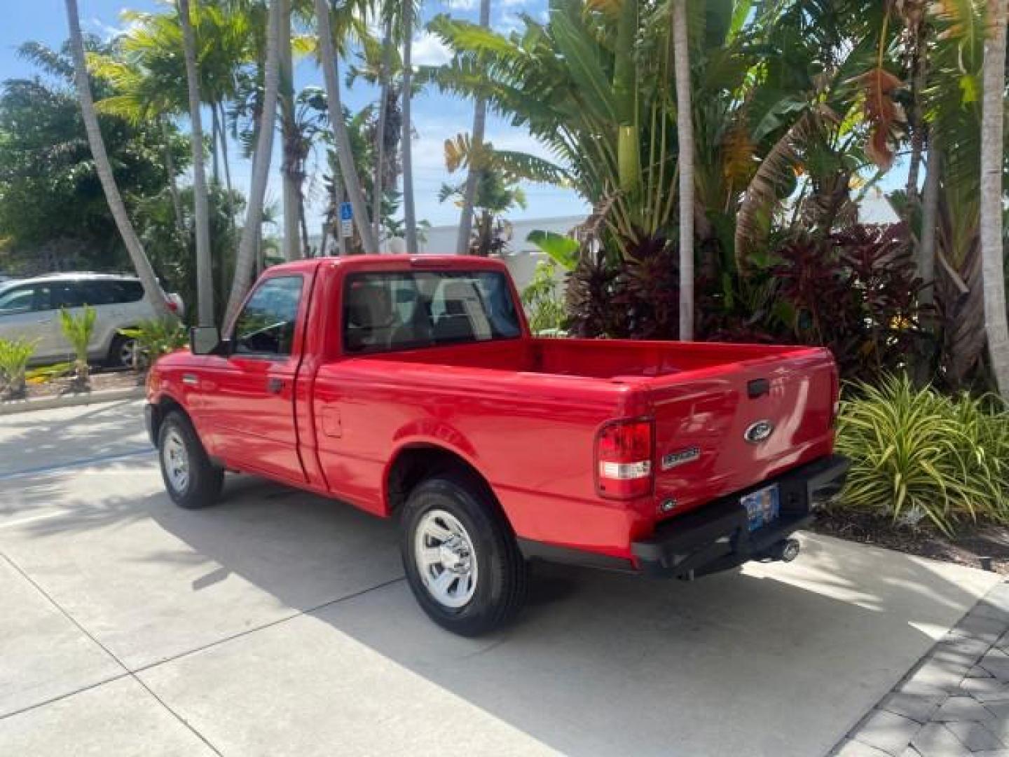2010 Torch Red /Medium Dark Flint Ford Ranger XL LOW MILES 45,669 4 CYL 5 SPD (1FTKR1AD2AP) with an 2.3L DOHC 16-Valve I4 Engine engine, Manual transmission, located at 4701 North Dixie Hwy, Pompano Beach, FL, 33064, (954) 422-2889, 26.240938, -80.123474 - OUR WEBPAGE FLORIDACARS1.COM HAS OVER 100 PHOTOS AND FREE CARFAX LINK 2010 FORD RANGER XL VIN: 1FTKR1AD2APA10334 1 F T K R 1 A D 2 A P A 1 0 3 3 4 PICKUP 2.3L I4 F DOHC 16V GASOLINE REAR WHEEL DRIVE Features ABS Brakes Air Conditioning AM/FM Stereo Manual Transmission Side Airbags Tow Hitch Traction - Photo#5