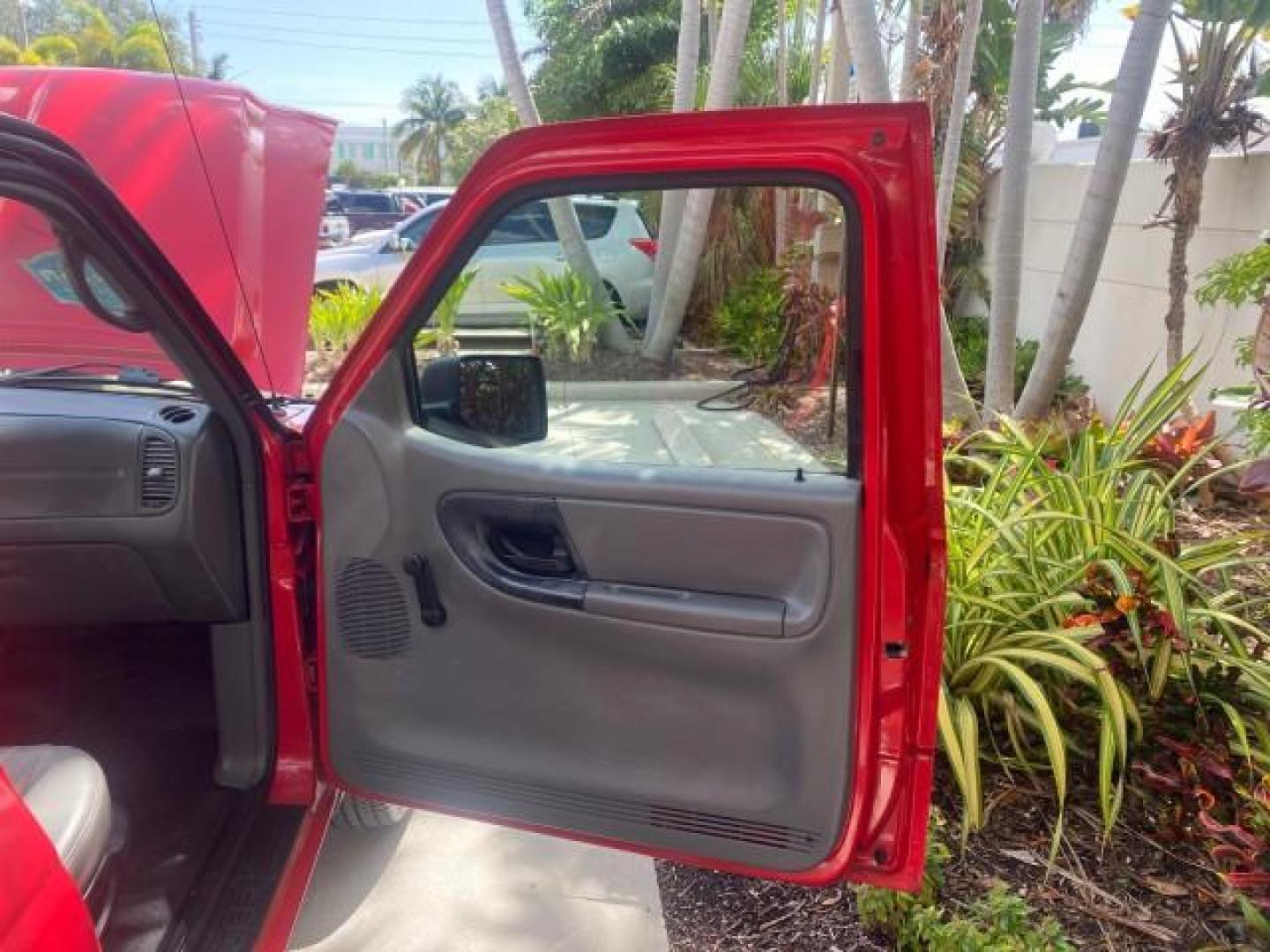 2010 Torch Red /Medium Dark Flint Ford Ranger XL LOW MILES 45,669 4 CYL 5 SPD (1FTKR1AD2AP) with an 2.3L DOHC 16-Valve I4 Engine engine, Manual transmission, located at 4701 North Dixie Hwy, Pompano Beach, FL, 33064, (954) 422-2889, 26.240938, -80.123474 - OUR WEBPAGE FLORIDACARS1.COM HAS OVER 100 PHOTOS AND FREE CARFAX LINK 2010 FORD RANGER XL VIN: 1FTKR1AD2APA10334 1 F T K R 1 A D 2 A P A 1 0 3 3 4 PICKUP 2.3L I4 F DOHC 16V GASOLINE REAR WHEEL DRIVE Features ABS Brakes Air Conditioning AM/FM Stereo Manual Transmission Side Airbags Tow Hitch Traction - Photo#11