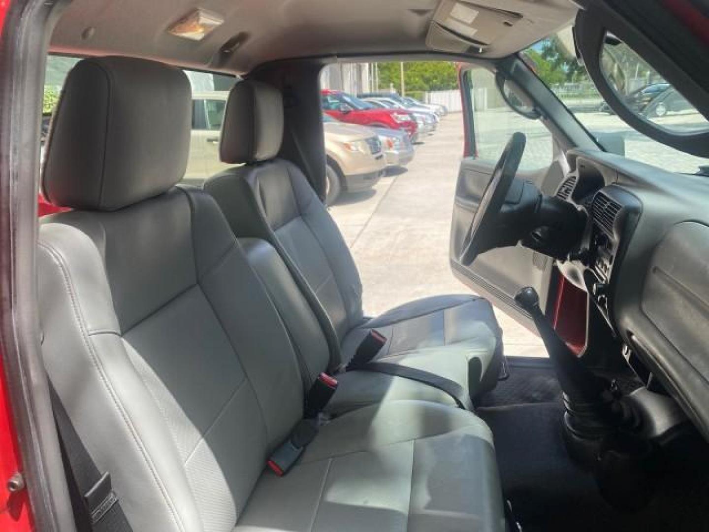 2010 Torch Red /Medium Dark Flint Ford Ranger XL LOW MILES 45,669 4 CYL 5 SPD (1FTKR1AD2AP) with an 2.3L DOHC 16-Valve I4 Engine engine, Manual transmission, located at 4701 North Dixie Hwy, Pompano Beach, FL, 33064, (954) 422-2889, 26.240938, -80.123474 - OUR WEBPAGE FLORIDACARS1.COM HAS OVER 100 PHOTOS AND FREE CARFAX LINK 2010 FORD RANGER XL VIN: 1FTKR1AD2APA10334 1 F T K R 1 A D 2 A P A 1 0 3 3 4 PICKUP 2.3L I4 F DOHC 16V GASOLINE REAR WHEEL DRIVE Features ABS Brakes Air Conditioning AM/FM Stereo Manual Transmission Side Airbags Tow Hitch Traction - Photo#12