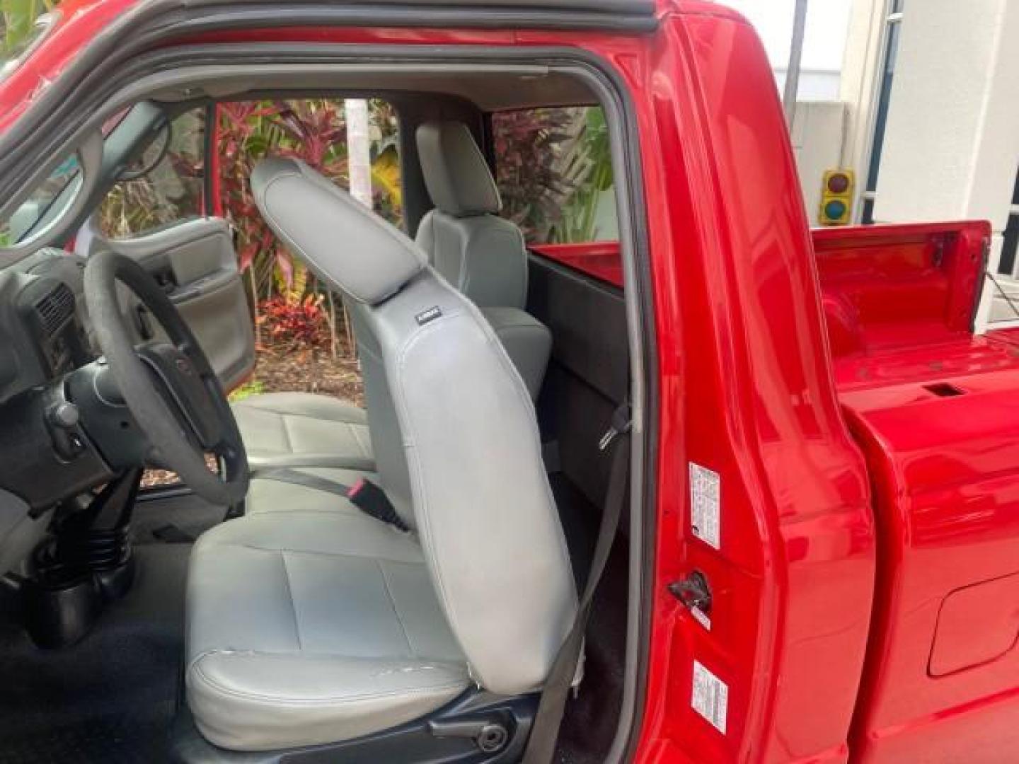 2010 Torch Red /Medium Dark Flint Ford Ranger XL LOW MILES 45,669 4 CYL 5 SPD (1FTKR1AD2AP) with an 2.3L DOHC 16-Valve I4 Engine engine, Manual transmission, located at 4701 North Dixie Hwy, Pompano Beach, FL, 33064, (954) 422-2889, 26.240938, -80.123474 - OUR WEBPAGE FLORIDACARS1.COM HAS OVER 100 PHOTOS AND FREE CARFAX LINK 2010 FORD RANGER XL VIN: 1FTKR1AD2APA10334 1 F T K R 1 A D 2 A P A 1 0 3 3 4 PICKUP 2.3L I4 F DOHC 16V GASOLINE REAR WHEEL DRIVE Features ABS Brakes Air Conditioning AM/FM Stereo Manual Transmission Side Airbags Tow Hitch Traction - Photo#13