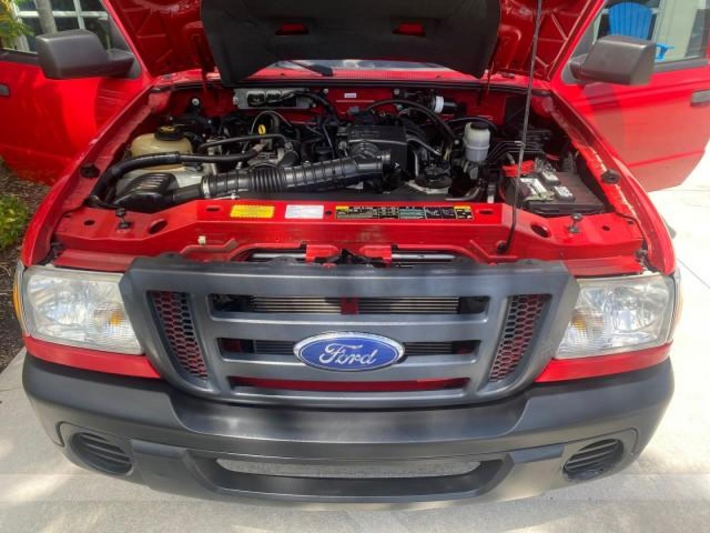 2010 Torch Red /Medium Dark Flint Ford Ranger XL LOW MILES 45,669 4 CYL 5 SPD (1FTKR1AD2AP) with an 2.3L DOHC 16-Valve I4 Engine engine, Manual transmission, located at 4701 North Dixie Hwy, Pompano Beach, FL, 33064, (954) 422-2889, 26.240938, -80.123474 - OUR WEBPAGE FLORIDACARS1.COM HAS OVER 100 PHOTOS AND FREE CARFAX LINK 2010 FORD RANGER XL VIN: 1FTKR1AD2APA10334 1 F T K R 1 A D 2 A P A 1 0 3 3 4 PICKUP 2.3L I4 F DOHC 16V GASOLINE REAR WHEEL DRIVE Features ABS Brakes Air Conditioning AM/FM Stereo Manual Transmission Side Airbags Tow Hitch Traction - Photo#17