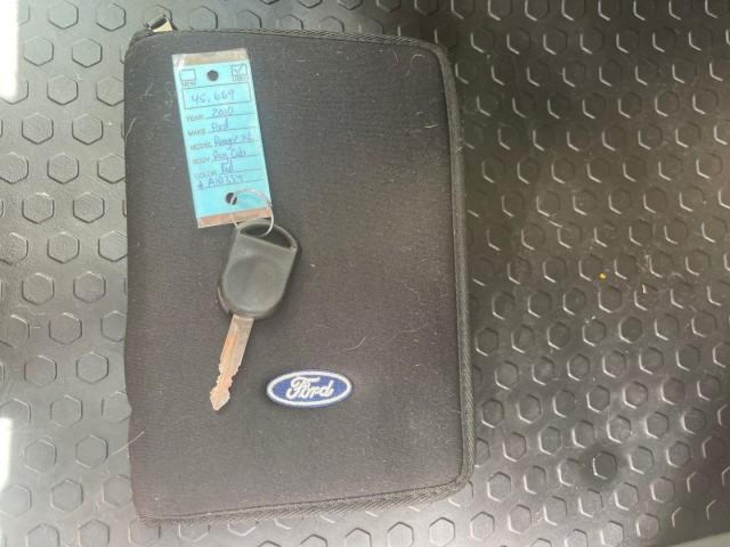 2010 Torch Red /Medium Dark Flint Ford Ranger XL LOW MILES 45,669 4 CYL 5 SPD (1FTKR1AD2AP) with an 2.3L DOHC 16-Valve I4 Engine engine, Manual transmission, located at 4701 North Dixie Hwy, Pompano Beach, FL, 33064, (954) 422-2889, 26.240938, -80.123474 - OUR WEBPAGE FLORIDACARS1.COM HAS OVER 100 PHOTOS AND FREE CARFAX LINK 2010 FORD RANGER XL VIN: 1FTKR1AD2APA10334 1 F T K R 1 A D 2 A P A 1 0 3 3 4 PICKUP 2.3L I4 F DOHC 16V GASOLINE REAR WHEEL DRIVE Features ABS Brakes Air Conditioning AM/FM Stereo Manual Transmission Side Airbags Tow Hitch Traction - Photo#23