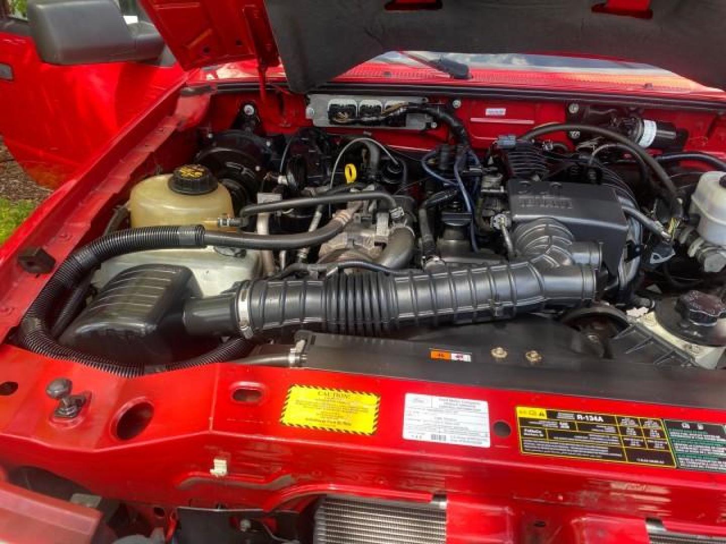 2010 Torch Red /Medium Dark Flint Ford Ranger XL LOW MILES 45,669 4 CYL 5 SPD (1FTKR1AD2AP) with an 2.3L DOHC 16-Valve I4 Engine engine, Manual transmission, located at 4701 North Dixie Hwy, Pompano Beach, FL, 33064, (954) 422-2889, 26.240938, -80.123474 - OUR WEBPAGE FLORIDACARS1.COM HAS OVER 100 PHOTOS AND FREE CARFAX LINK 2010 FORD RANGER XL VIN: 1FTKR1AD2APA10334 1 F T K R 1 A D 2 A P A 1 0 3 3 4 PICKUP 2.3L I4 F DOHC 16V GASOLINE REAR WHEEL DRIVE Features ABS Brakes Air Conditioning AM/FM Stereo Manual Transmission Side Airbags Tow Hitch Traction - Photo#24