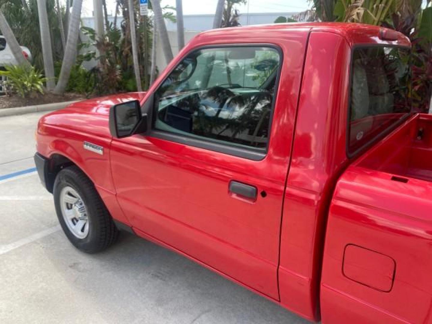 2010 Torch Red /Medium Dark Flint Ford Ranger XL LOW MILES 45,669 4 CYL 5 SPD (1FTKR1AD2AP) with an 2.3L DOHC 16-Valve I4 Engine engine, Manual transmission, located at 4701 North Dixie Hwy, Pompano Beach, FL, 33064, (954) 422-2889, 26.240938, -80.123474 - OUR WEBPAGE FLORIDACARS1.COM HAS OVER 100 PHOTOS AND FREE CARFAX LINK 2010 FORD RANGER XL VIN: 1FTKR1AD2APA10334 1 F T K R 1 A D 2 A P A 1 0 3 3 4 PICKUP 2.3L I4 F DOHC 16V GASOLINE REAR WHEEL DRIVE Features ABS Brakes Air Conditioning AM/FM Stereo Manual Transmission Side Airbags Tow Hitch Traction - Photo#26
