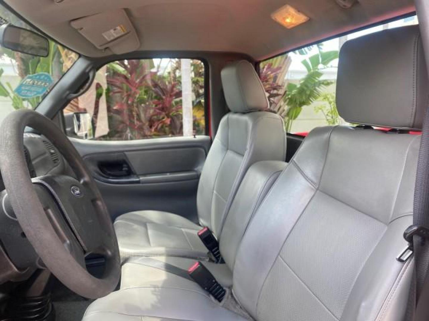 2010 Torch Red /Medium Dark Flint Ford Ranger XL LOW MILES 45,669 4 CYL 5 SPD (1FTKR1AD2AP) with an 2.3L DOHC 16-Valve I4 Engine engine, Manual transmission, located at 4701 North Dixie Hwy, Pompano Beach, FL, 33064, (954) 422-2889, 26.240938, -80.123474 - OUR WEBPAGE FLORIDACARS1.COM HAS OVER 100 PHOTOS AND FREE CARFAX LINK 2010 FORD RANGER XL VIN: 1FTKR1AD2APA10334 1 F T K R 1 A D 2 A P A 1 0 3 3 4 PICKUP 2.3L I4 F DOHC 16V GASOLINE REAR WHEEL DRIVE Features ABS Brakes Air Conditioning AM/FM Stereo Manual Transmission Side Airbags Tow Hitch Traction - Photo#33