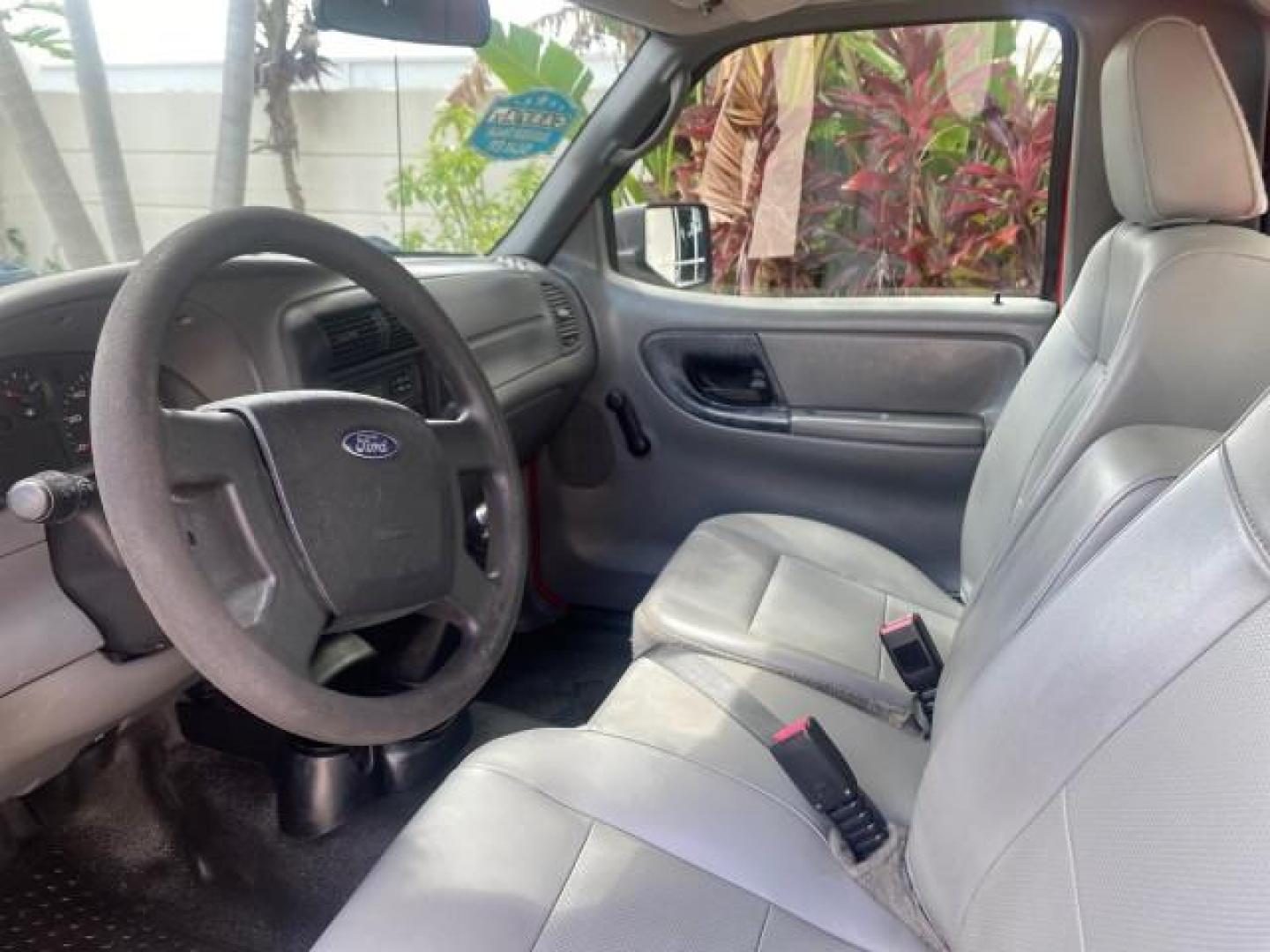 2010 Torch Red /Medium Dark Flint Ford Ranger XL LOW MILES 45,669 4 CYL 5 SPD (1FTKR1AD2AP) with an 2.3L DOHC 16-Valve I4 Engine engine, Manual transmission, located at 4701 North Dixie Hwy, Pompano Beach, FL, 33064, (954) 422-2889, 26.240938, -80.123474 - OUR WEBPAGE FLORIDACARS1.COM HAS OVER 100 PHOTOS AND FREE CARFAX LINK 2010 FORD RANGER XL VIN: 1FTKR1AD2APA10334 1 F T K R 1 A D 2 A P A 1 0 3 3 4 PICKUP 2.3L I4 F DOHC 16V GASOLINE REAR WHEEL DRIVE Features ABS Brakes Air Conditioning AM/FM Stereo Manual Transmission Side Airbags Tow Hitch Traction - Photo#35